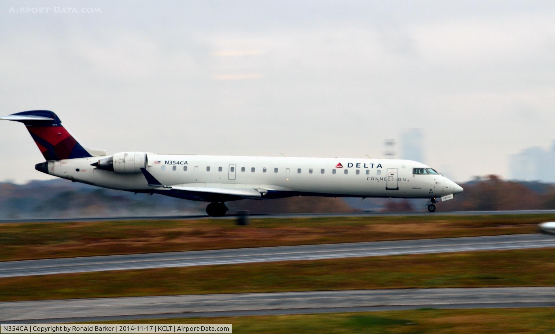 N354CA, 2002 Bombardier CRJ-701ER (CL-600-2C10) Regional Jet C/N 10064, Takeoff CLT