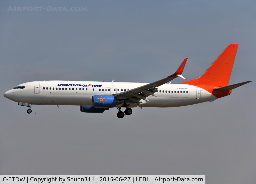C-FTDW, 2006 Boeing 737-808 C/N 34704, Landing rwy 25R with scimitar winglets and in basic Sunwing c/s with Smartwings titles