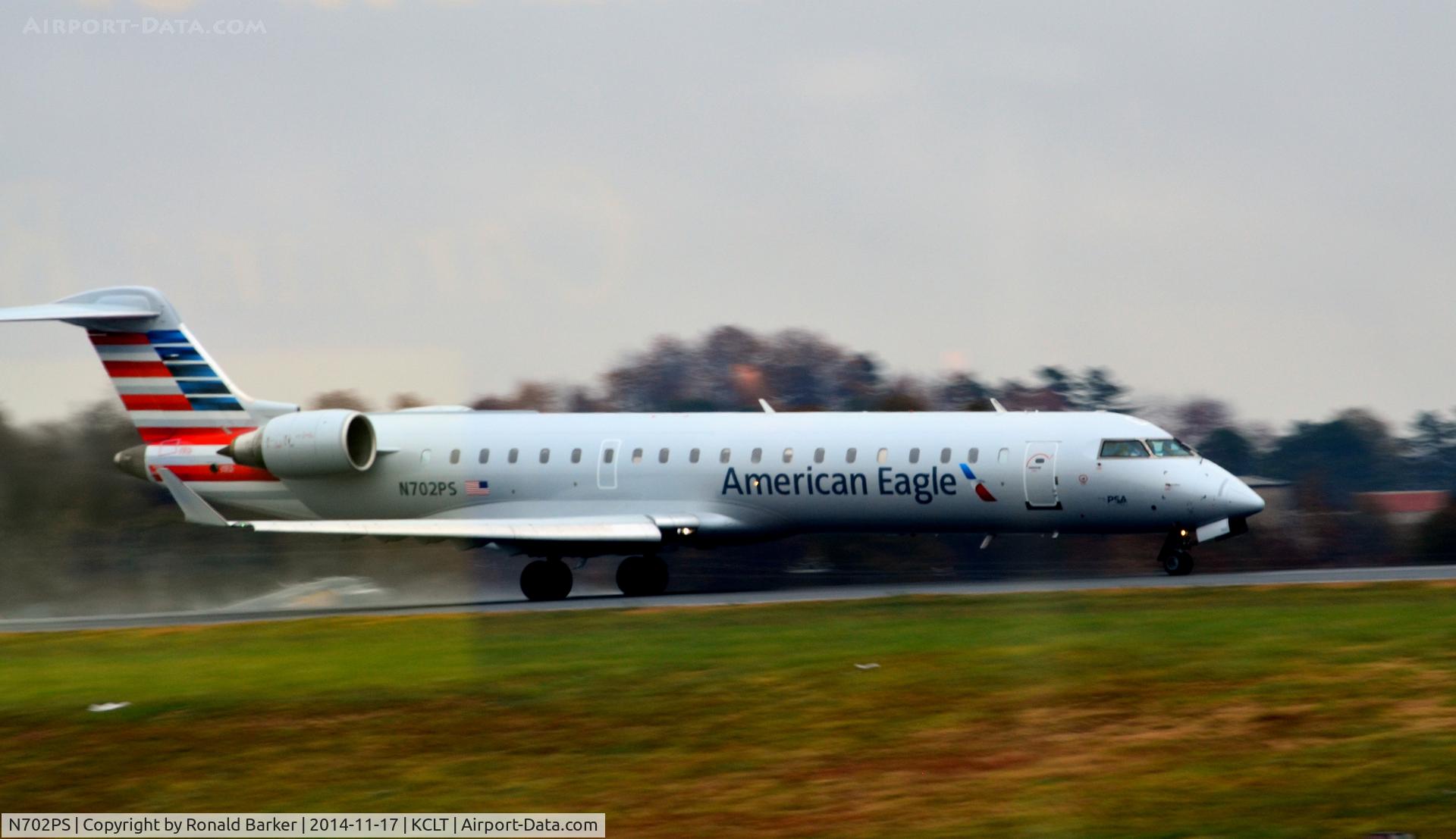 N702PS, 2004 Bombardier CRJ-701 (CL-600-2C10) Regional Jet C/N 10135, Takeoff CLT