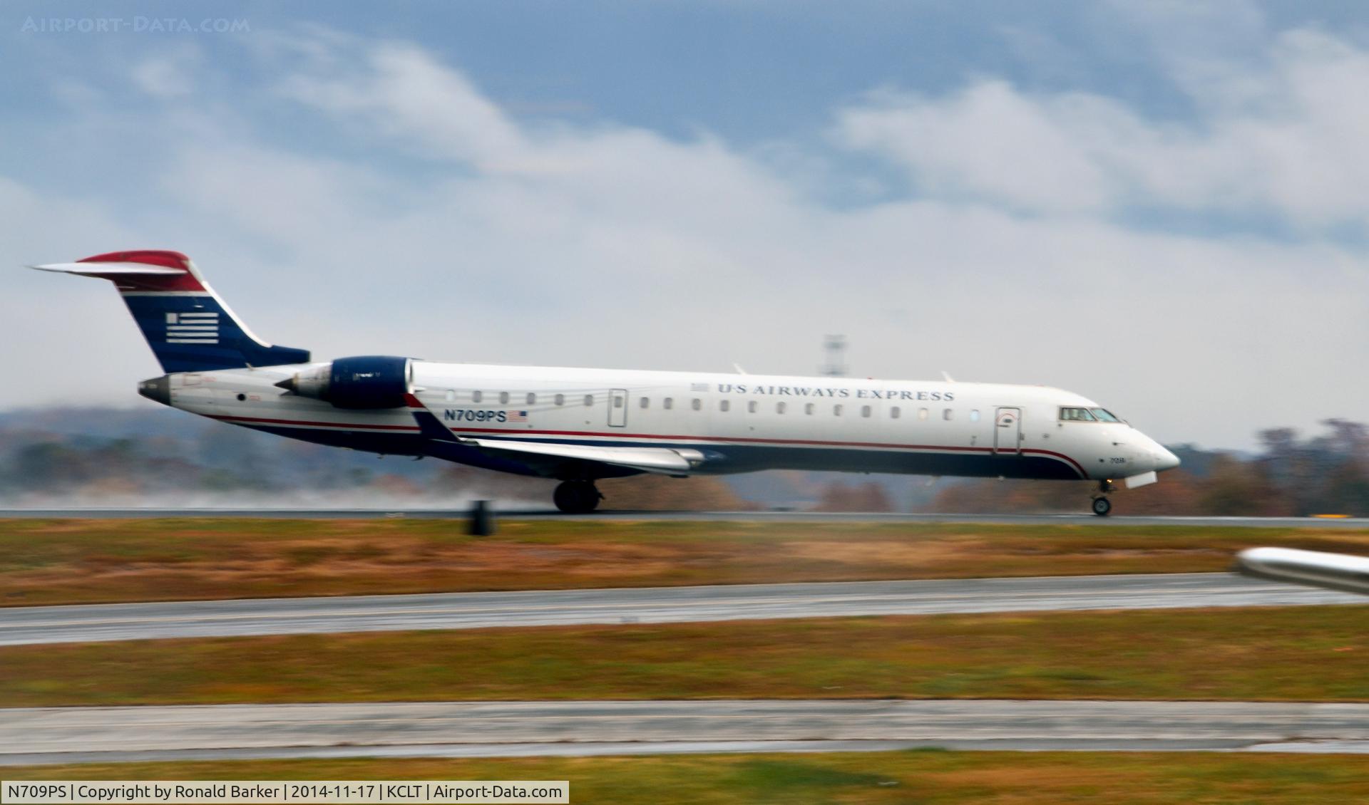 N709PS, 2004 Bombardier CRJ-701 (CL-600-2C10) Regional Jet C/N 10165, Takeoff CLT