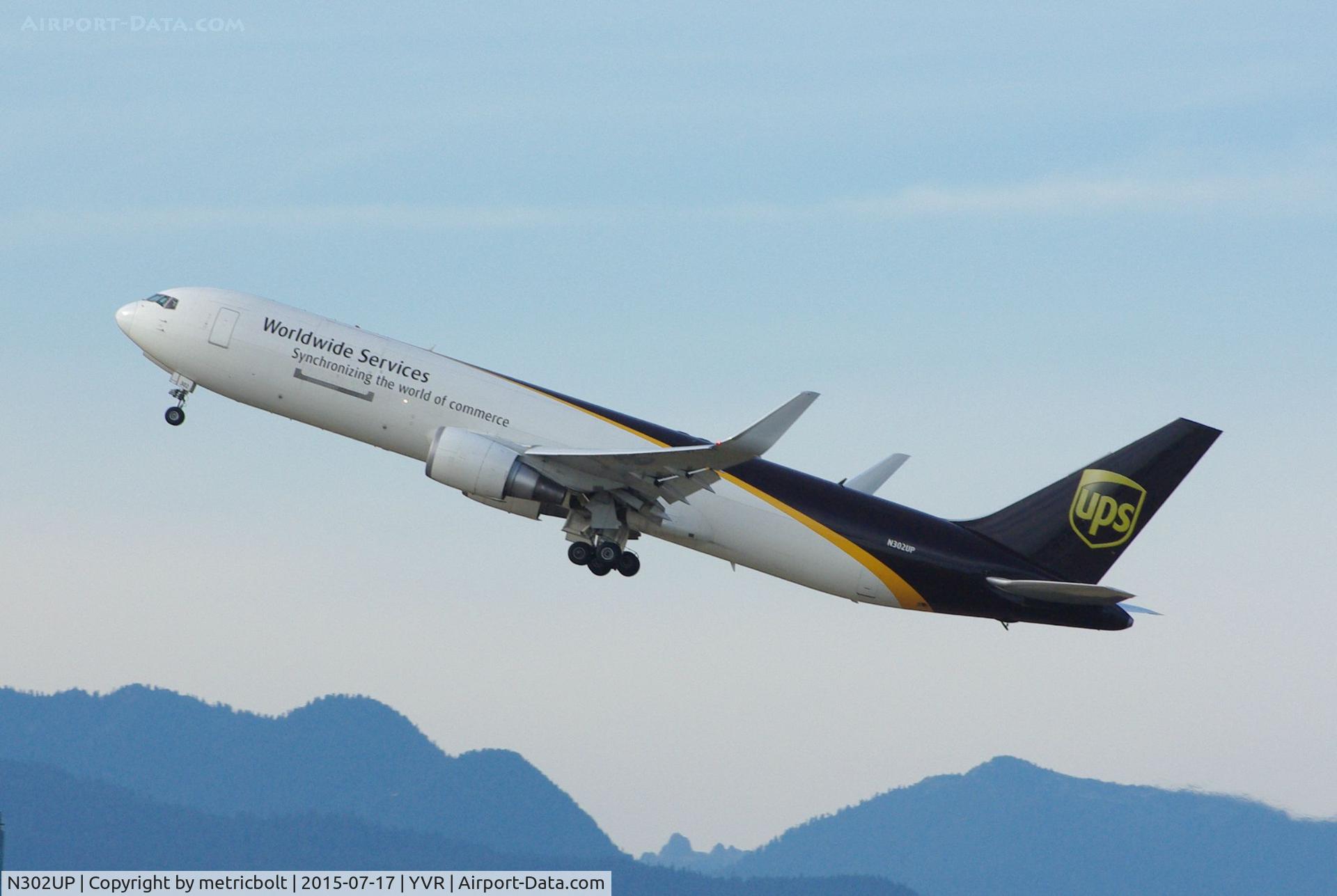 N302UP, 1995 Boeing 767-34AFR C/N 27240, Departure from YVR