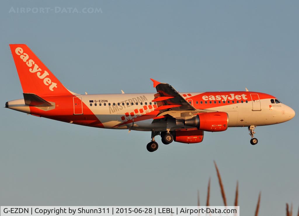G-EZDN, 2008 Airbus A319-111 C/N 3569, Landing rwy 25R in new c/s and with 'Amsterdam' special titles