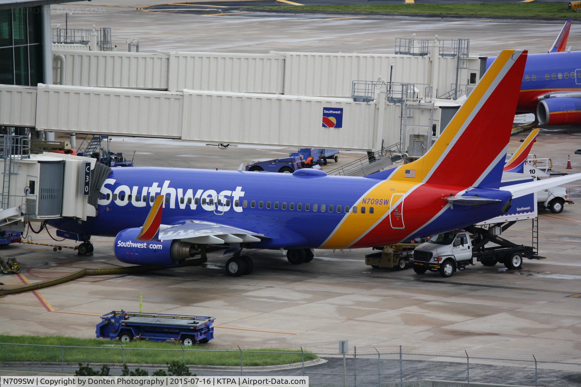 N709SW, 1998 Boeing 737-7H4 C/N 27843, Southwest Flight 3034 (N709SW) sits at the gate at Tampa International Airport prior to a flight to New Orleans International Airport