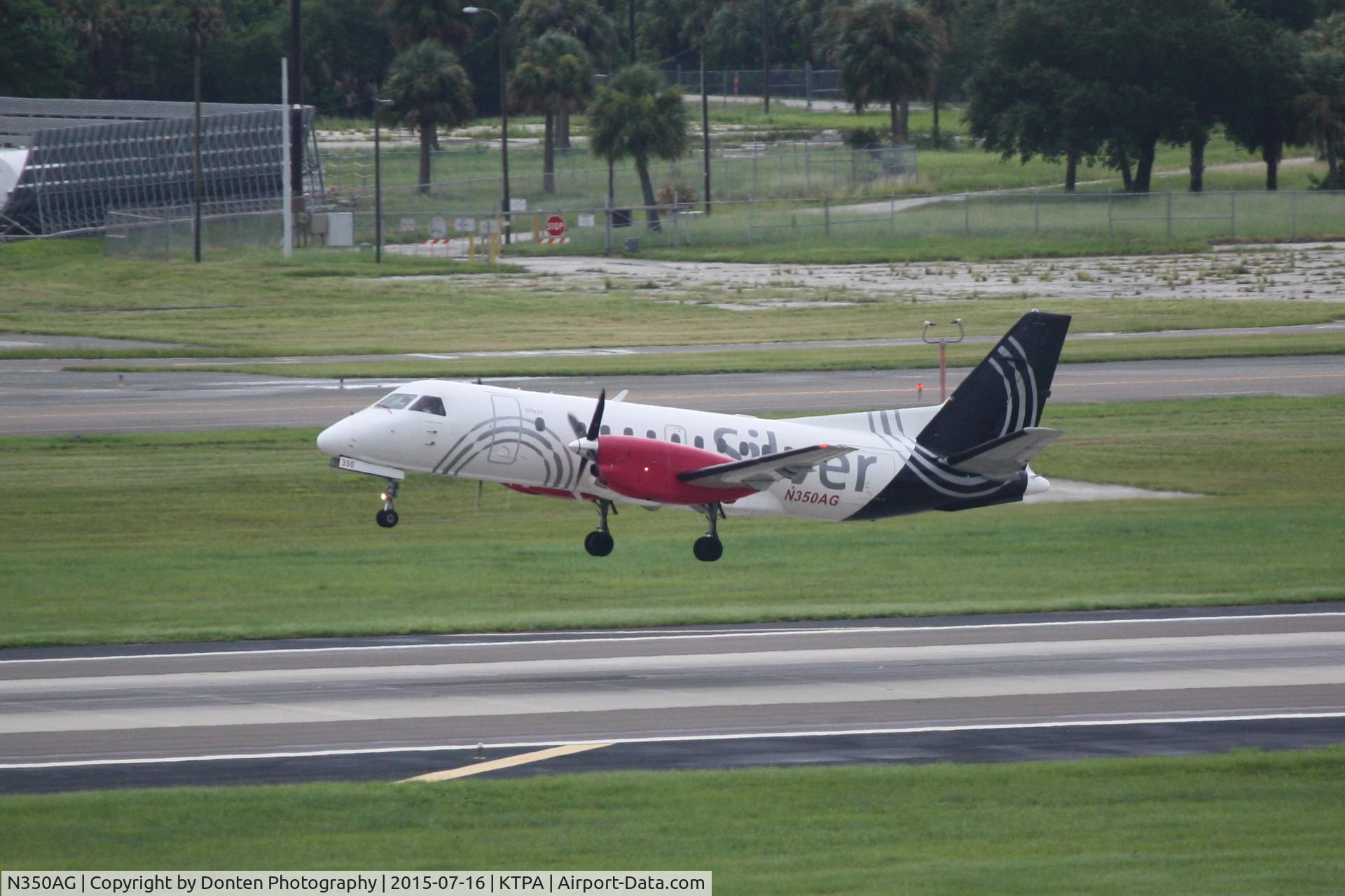 N350AG, 1998 Saab 340B+ C/N 340B-450, Silver Flight 93 (N350AG) departs Tampa International Airport enroute to Hollywood International Airport