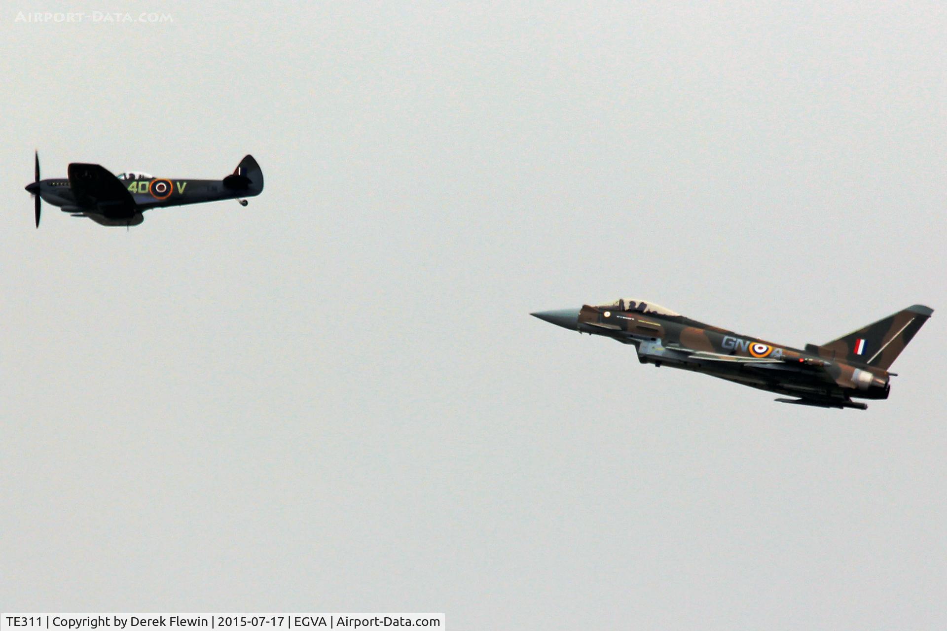 TE311, 1945 Supermarine 361 Spitfire LF.XVIe C/N CBAF.IX.4497, Supermarine 361 Spitfire, coded 4DV, BoB Memorial Flight, RAF Coningsby based, seen leading Typhoon ZK349, coded GNA, Syncro75, overflying the domestic site at RAF Fairford.