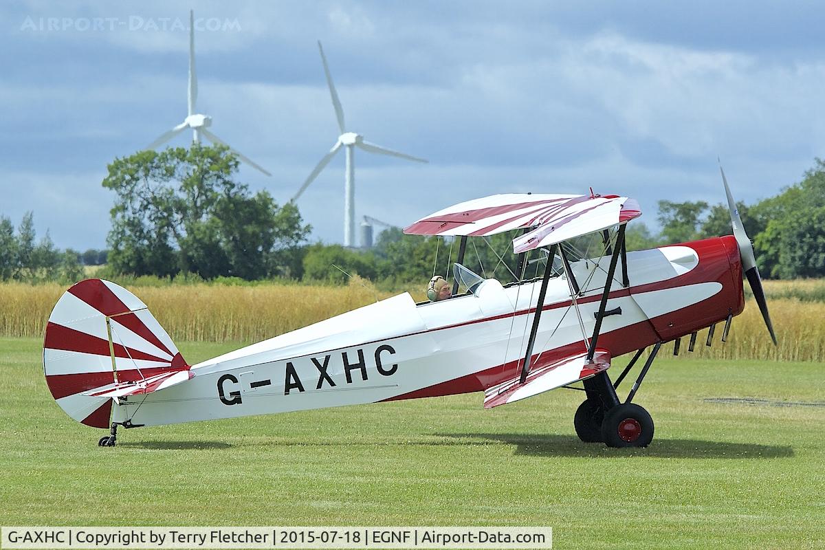 G-AXHC, 1946 Nord Stampe SV-4C C/N 293, 1946 Stampe-Vertongen SV-4C, c/n: 293 against a backdrop of wind farms at Netherthorpe