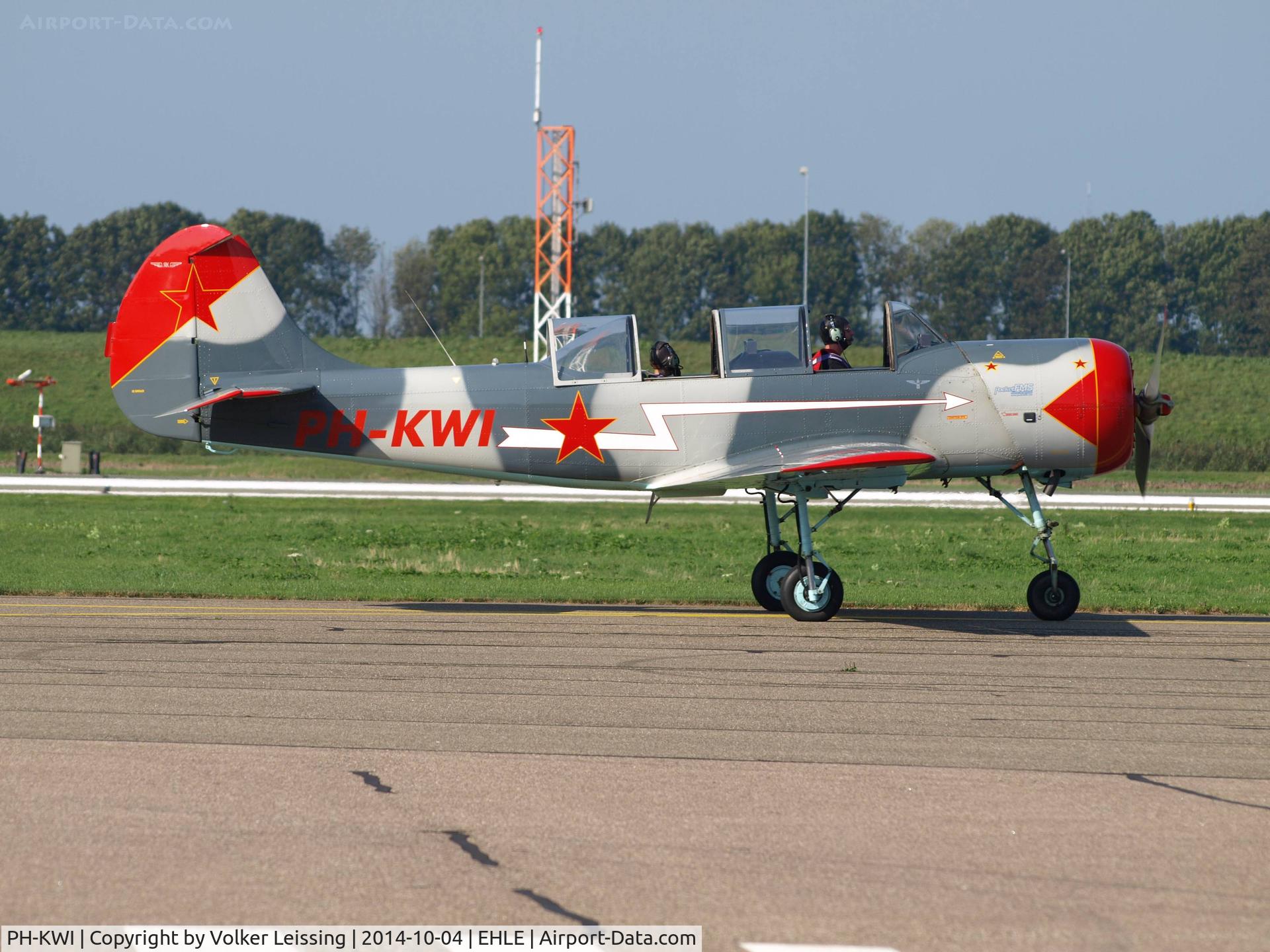 PH-KWI, 1989 Bacau Yak-52 C/N 899714, taxi to parking