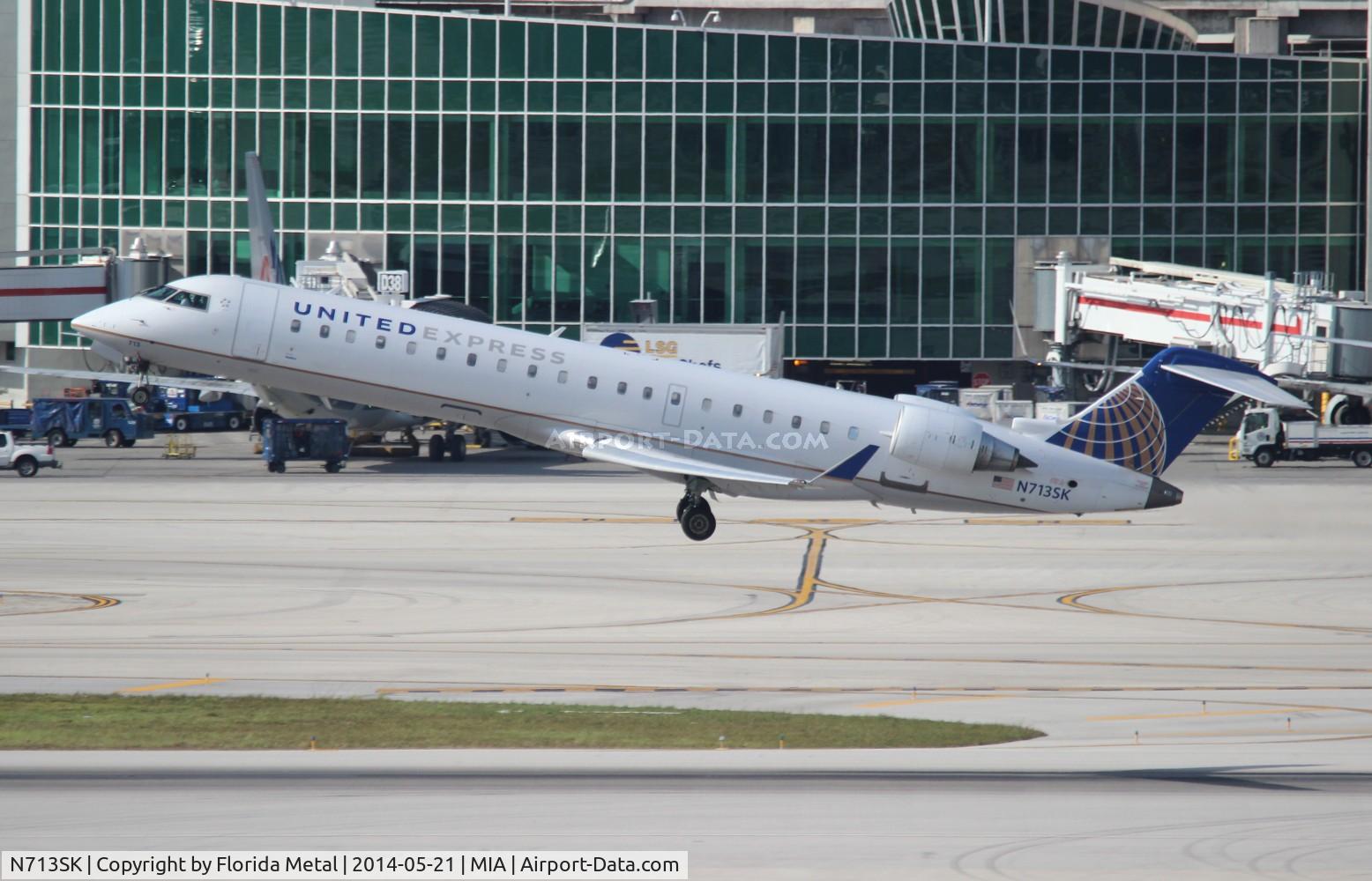 N713SK, 2004 Bombardier CRJ-701ER (CL-600-2C10) Regional Jet C/N 10174, United Express
