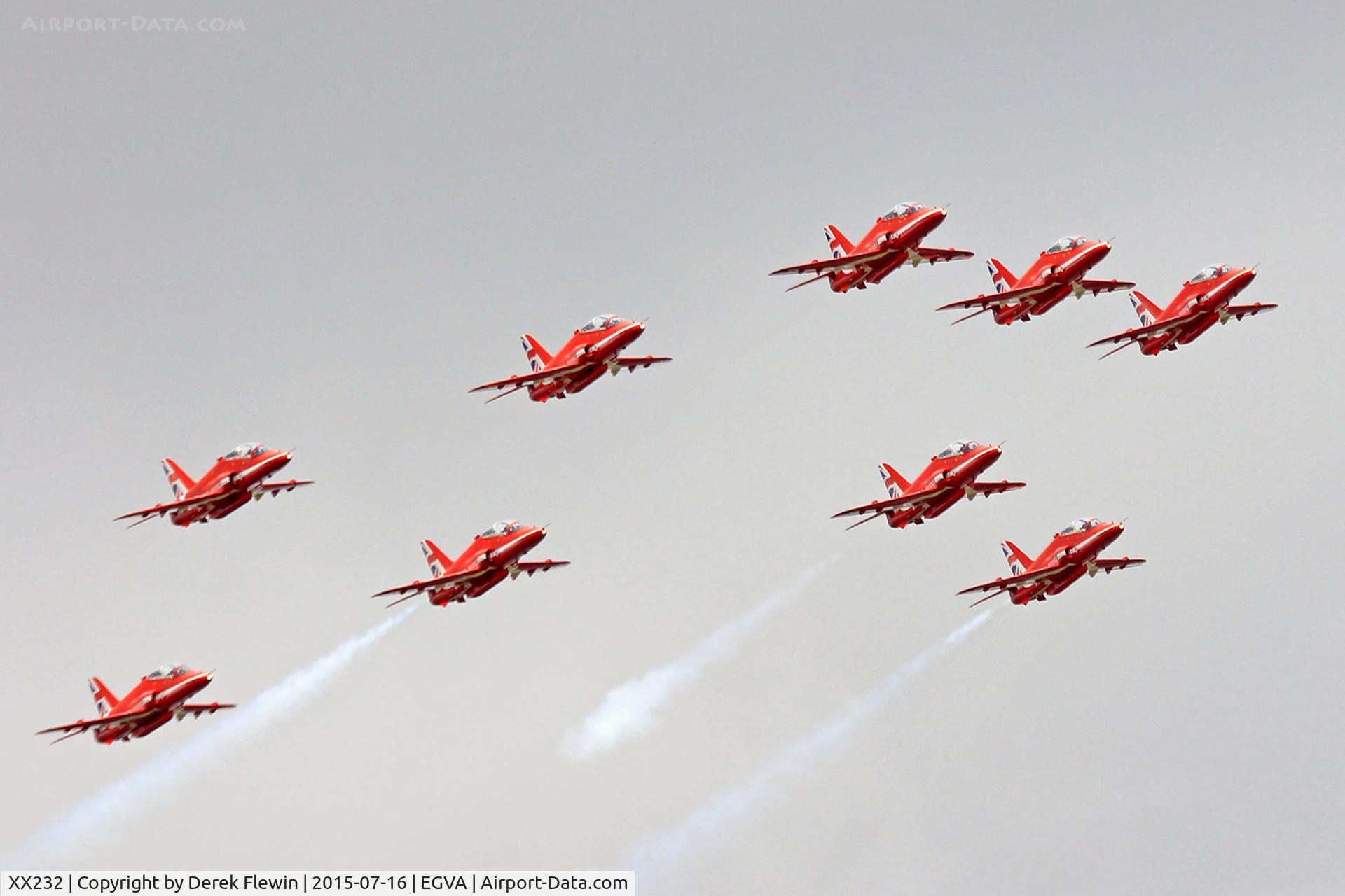 XX232, 1978 Hawker Siddeley Hawk T.1 C/N 068/312068, Hawk T.1, Red Arrows, RAF Scampton Based, led by  Team Leader, Red 1, Squadron Leader David Montenegro, seen overflying the domestic site at RAF Fairford.