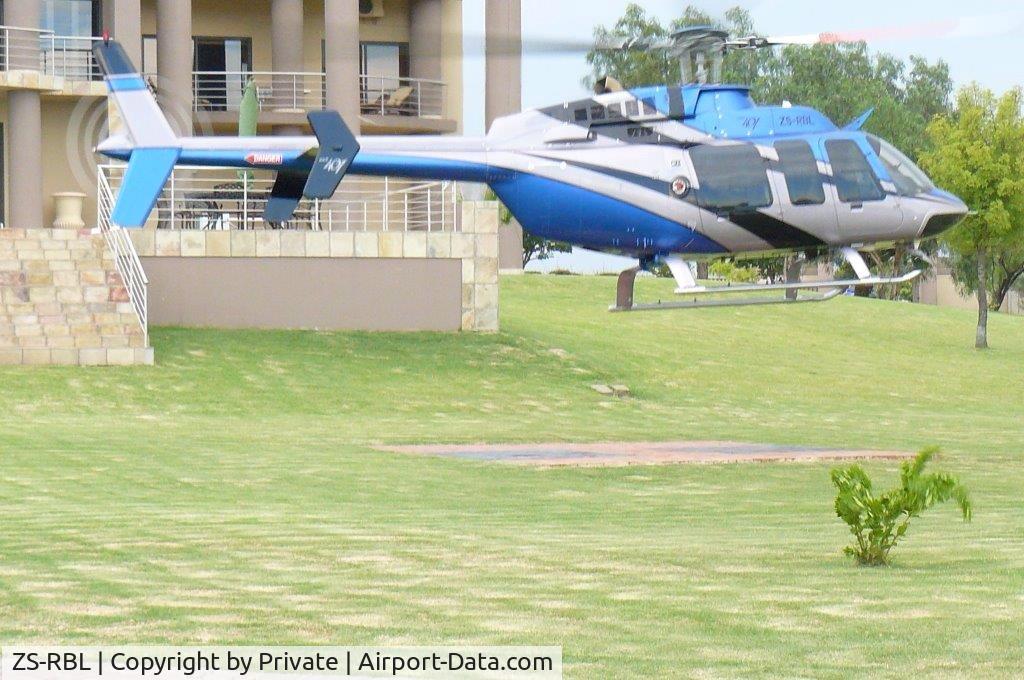 ZS-RBL, 2002 Bell 407 C/N 53548, ZS-RBL is now Blue