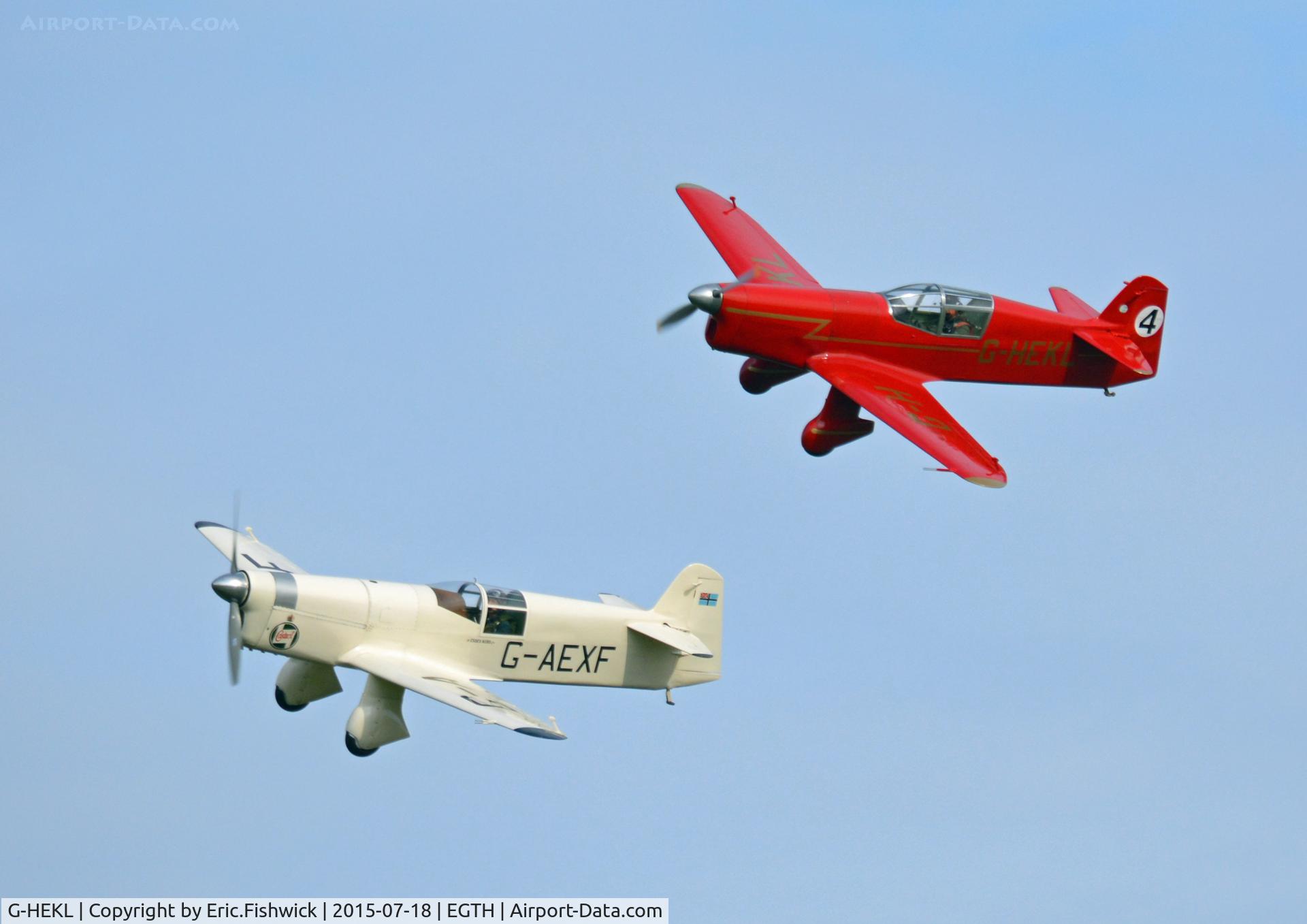 G-HEKL, 2008 Percival Mew Gull replica C/N PFA 013-14759, 45. G-HEKL with Shuttleworth's historic racing Mew Gull in display mode at Shuttleworth Best of British Airshow, July 2015.