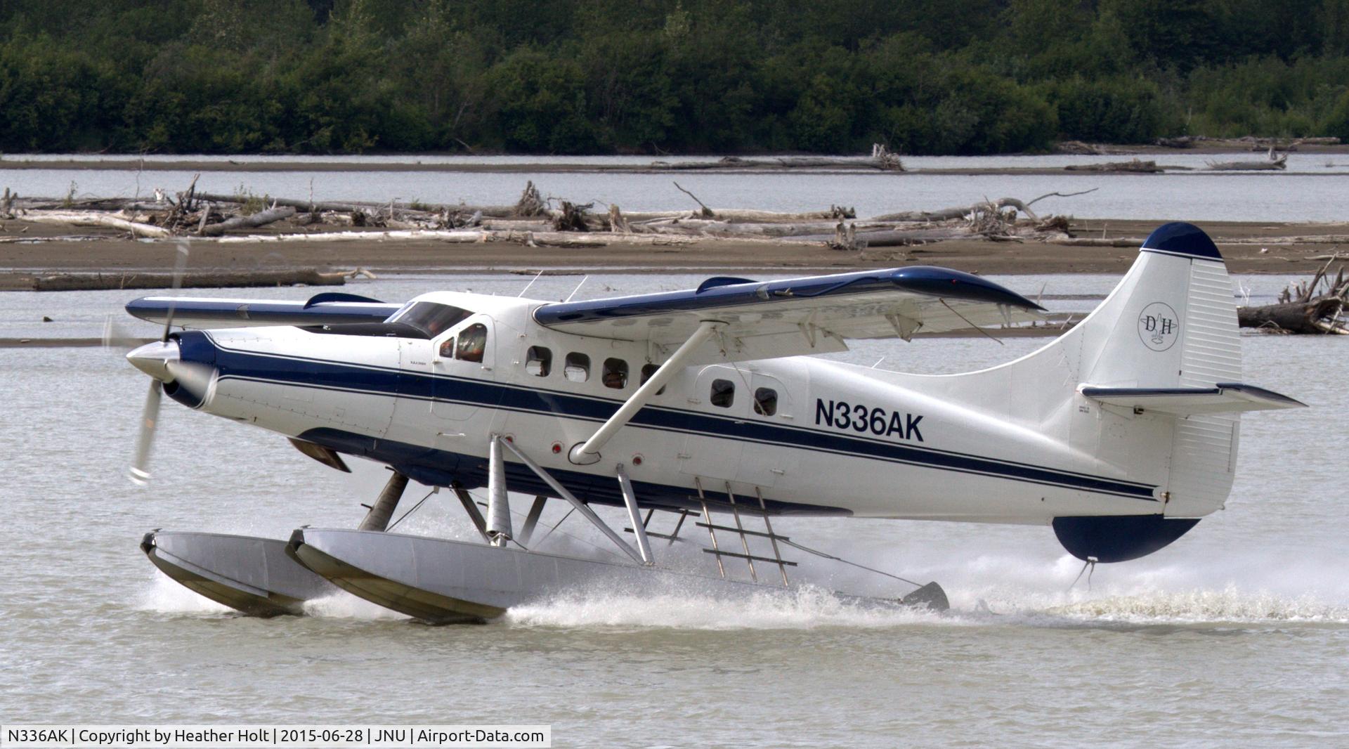 N336AK, 1958 De Havilland Canada DHC-3 Turbo Otter Otter C/N 333, Wings Airways N336AK landing on the Taku River at the lodge.  (Pilot:  Sam Stracener)