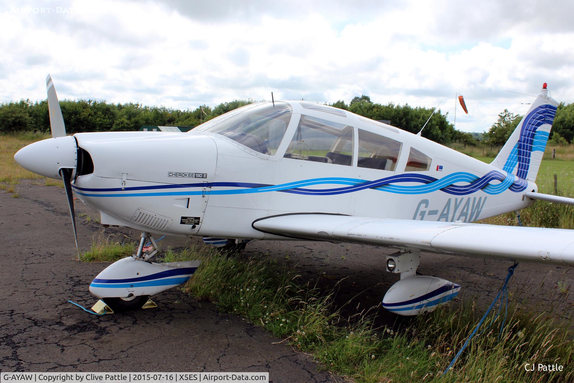 G-AYAW, 1970 Piper PA-28-180 Cherokee C/N 28-5805, This ex College of Air Training, Hamble aircraft, with its non-standard additional roof glazing, parked up at Eshott