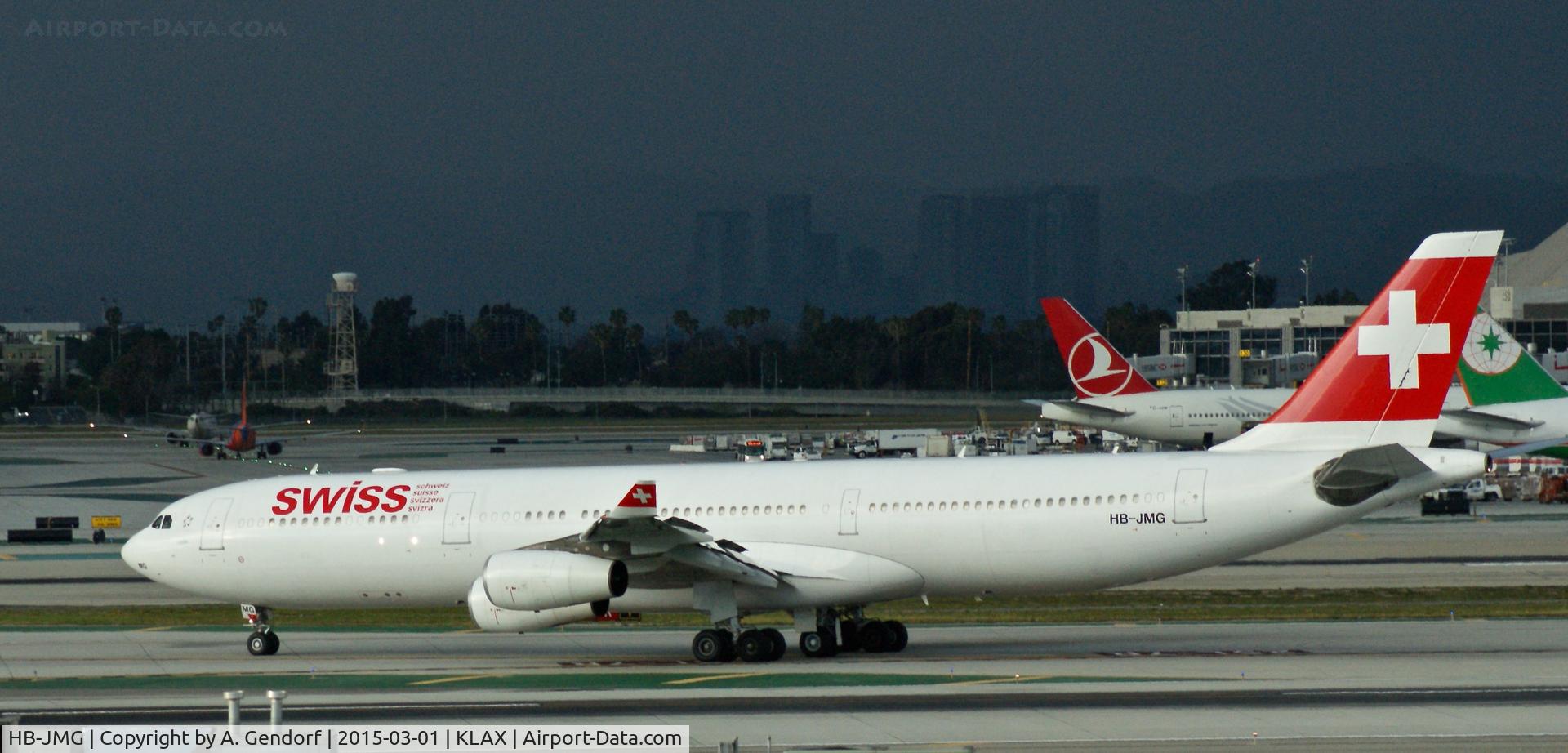 HB-JMG, 2003 Airbus A340-313 C/N 562, Swiss, is here taxiing to the gate shortly after arrival at Los Angeles Int'l(KLAX)