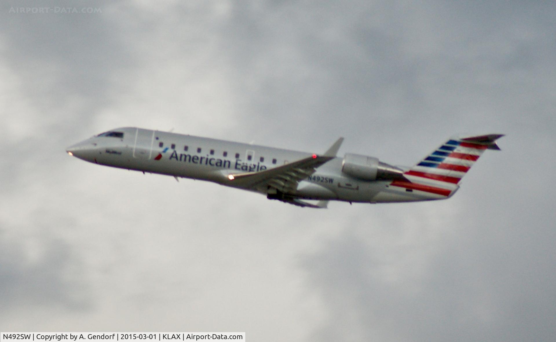 N492SW, 1997 Canadair CRJ-100ER (CL-600-2B19) C/N 7168, SkyWest (American Eagle cs.), is here climbing out at Los Angeles Int'l(KLAX)