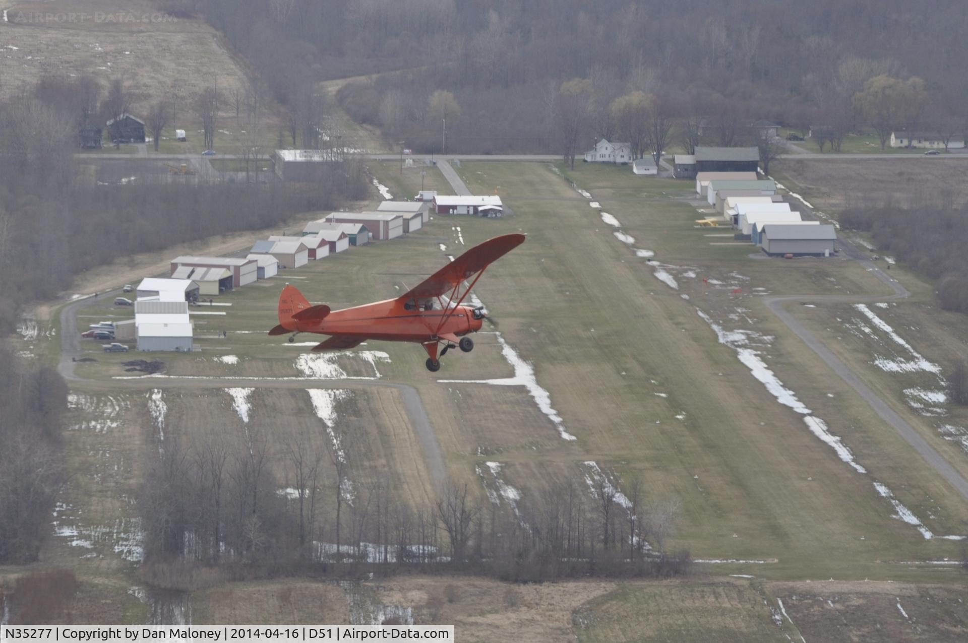 N35277, 1941 Piper J5A Cub Cruiser C/N 5-594, Turning final for a genuine 
