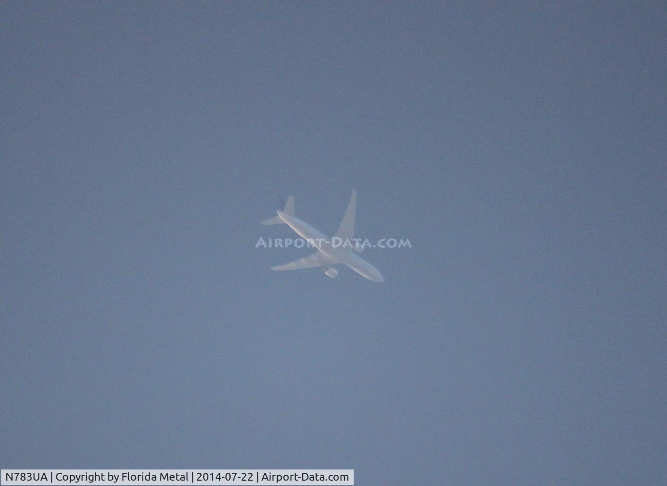 N783UA, 1997 Boeing 777-222/ER C/N 26950, United 777-200 flying 35,000 over Livonia MI ORD-CDG