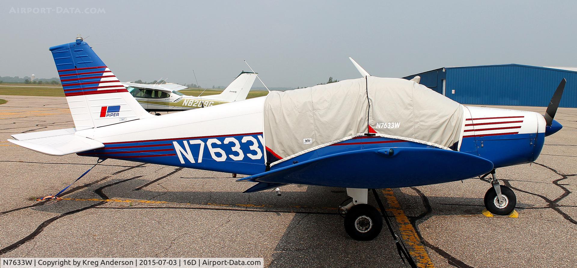 N7633W, 1964 Piper PA-28-180 C/N 28-1602, Piper PA-28-180 Cherokee 180 on the ramp in Perham, MN.