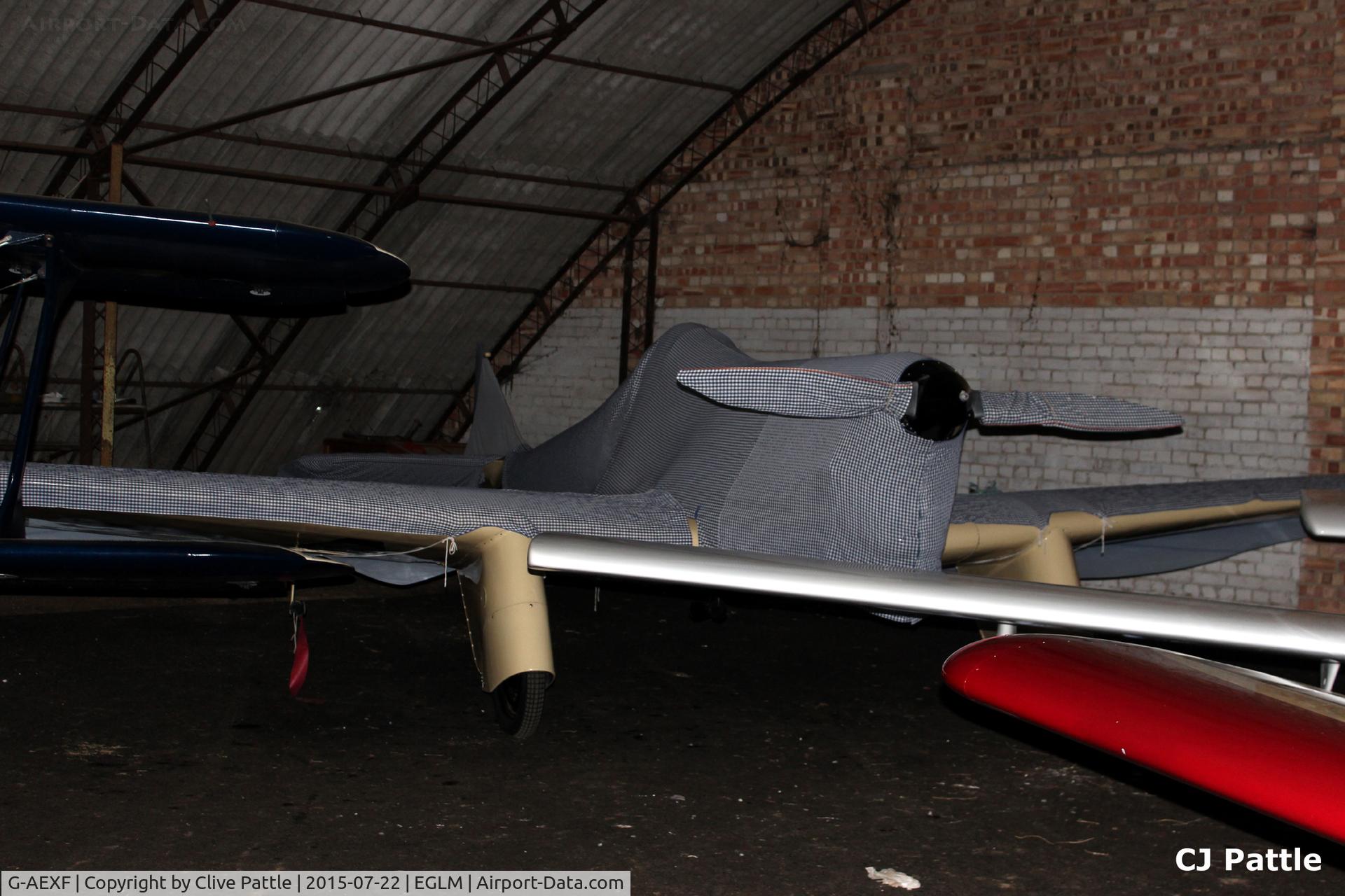 G-AEXF, 1936 Percival E-2H Mew Gull C/N E22, Well wrapped up and hangared at White Waltham EGLM
