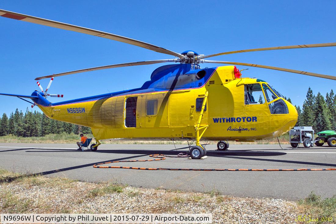 N9696W, 1960 Sikorsky S-61A C/N 61147, Parked on runway at Blue Canyon Airport, CA. Note exhaust residue on the fuselage.