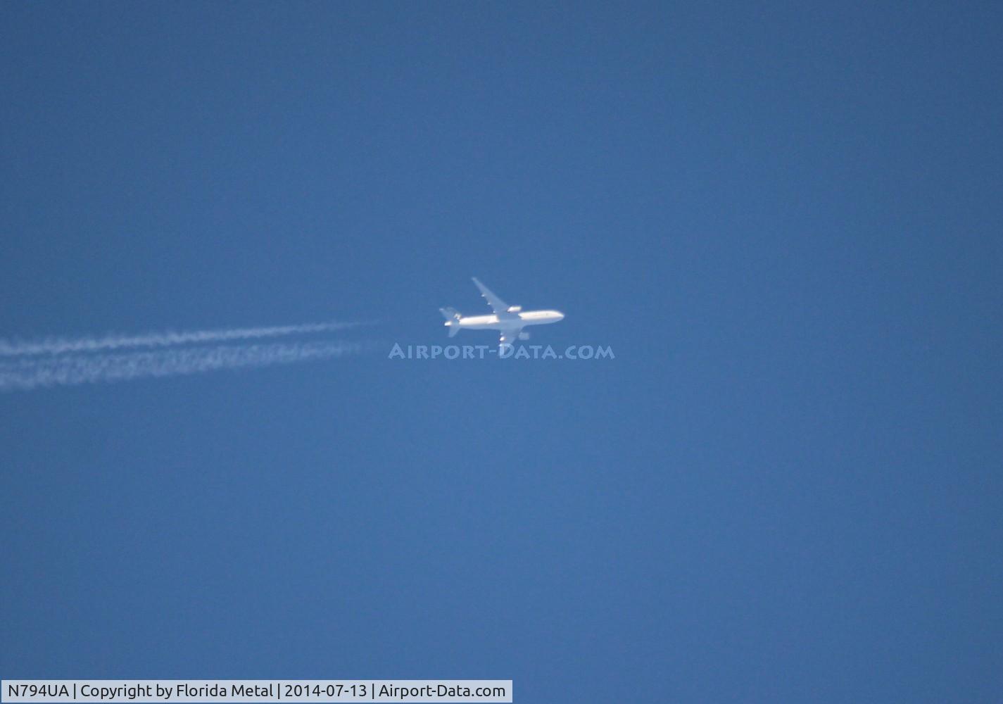 N794UA, 1997 Boeing 777-222 C/N 26953, United Star Alliance flying NRT-IAD at 37,000 ft over Livonia Michigan