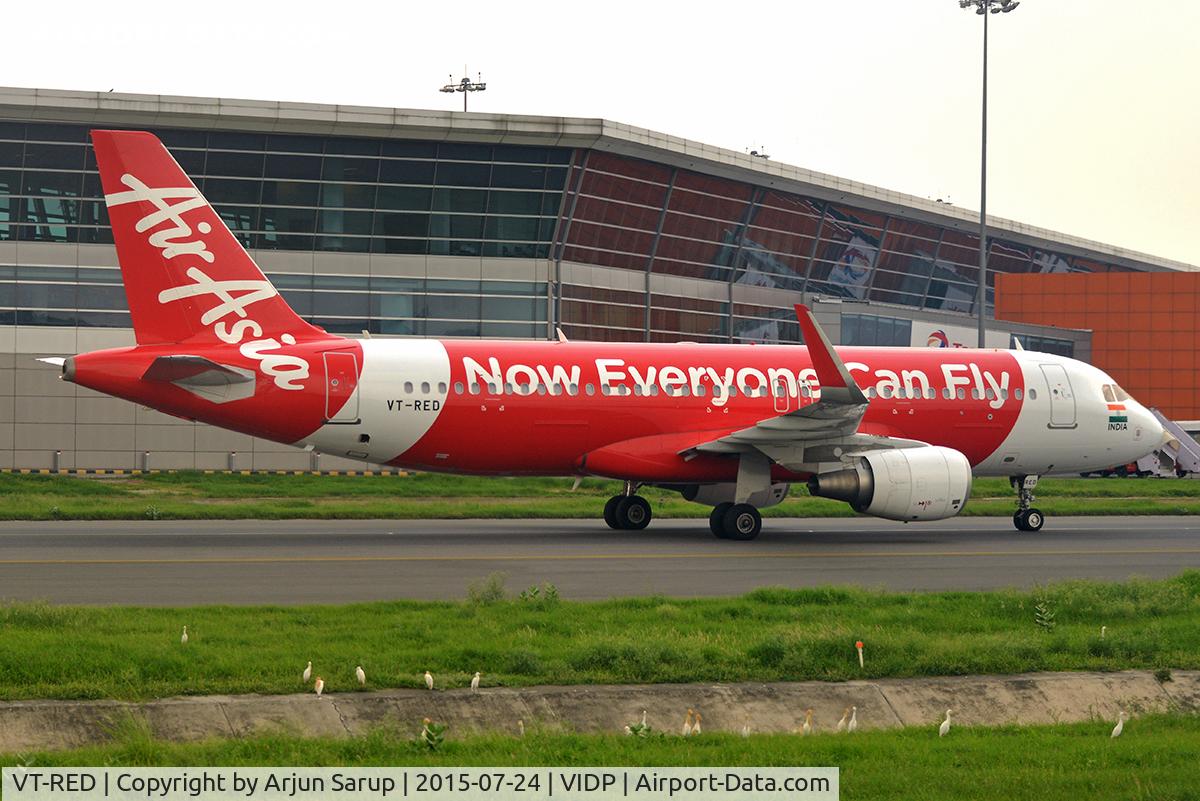 VT-RED, 2013 Airbus A320-216 C/N 5824, Give Me Red! Colorful VT-RED taxiing past IGIA T-3 for departure late in the afternoon.