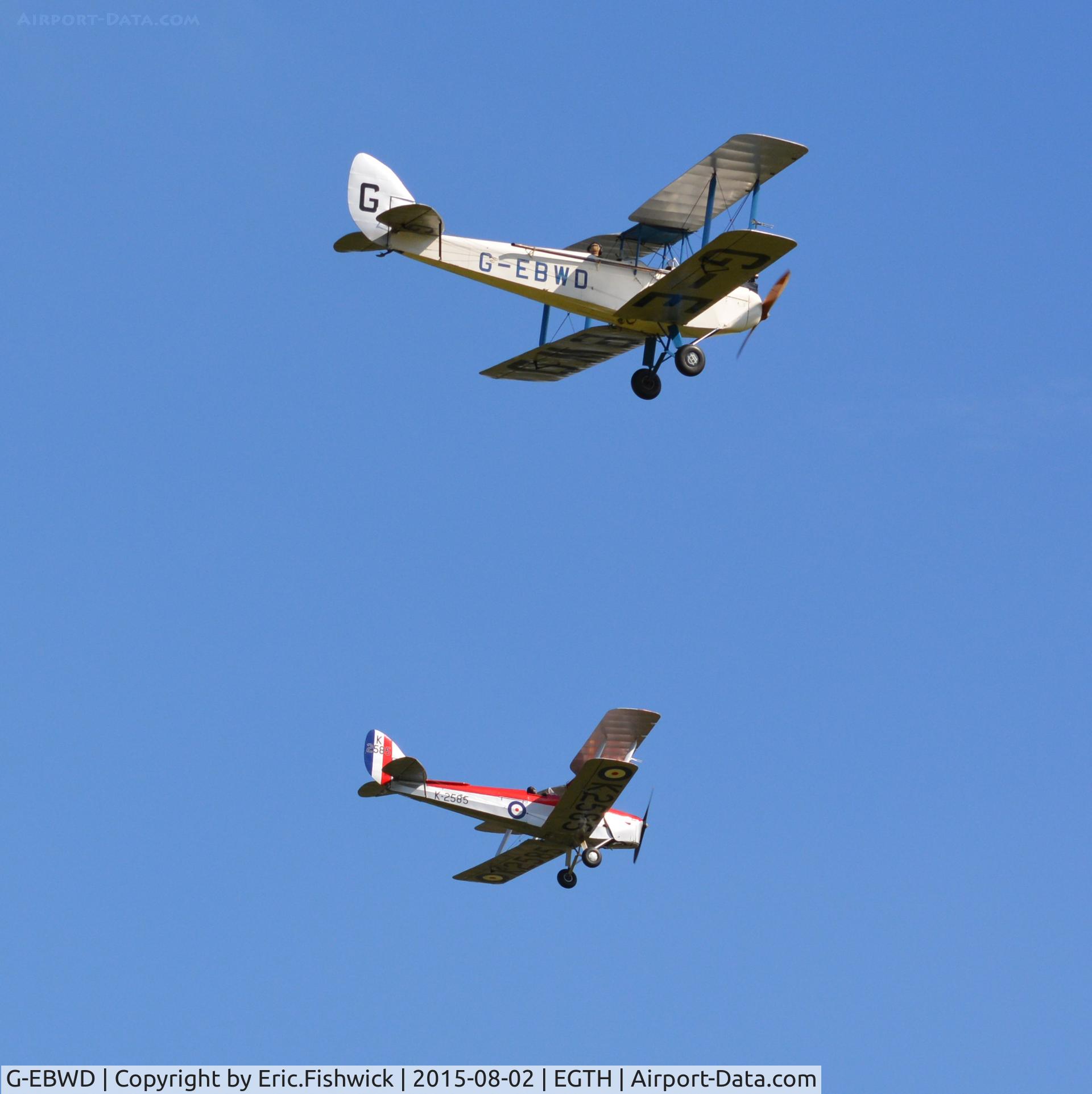 G-EBWD, 1928 De Havilland DH.60X Moth C/N 552, 45. DH60X Moth about to pass DH82A Tiger Moth during the Mock (handicapped) Air Race at Shuttleworth Wings and Wheels Airshow, Aug. 2015.