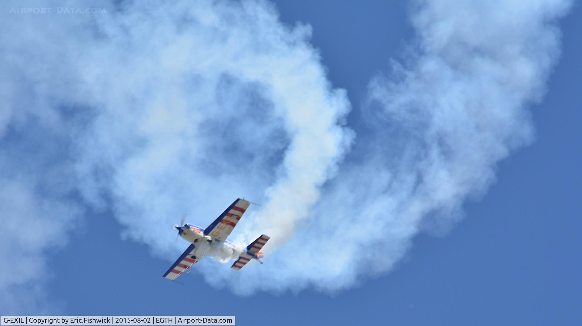 G-EXIL, 2010 Extra EA-300S C/N 1036, d. G-EXIL in display mode at The Shuttleworth Wings and Wheels Airshow, Aug. 2015.