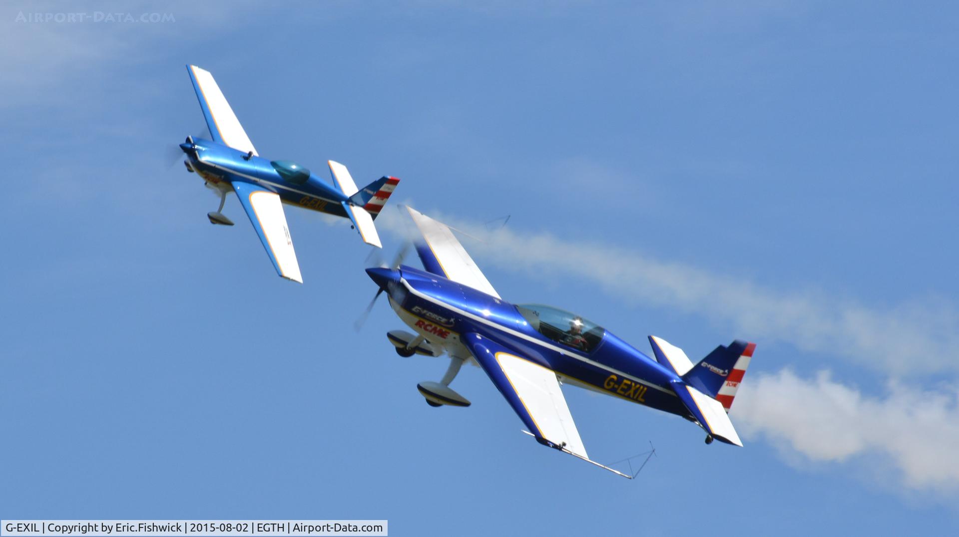 G-EXIL, 2010 Extra EA-300S C/N 1036, el. G-EXIL with R/C model in display mode at The Shuttleworth Wings and Wheels Airshow, Aug. 2015.
