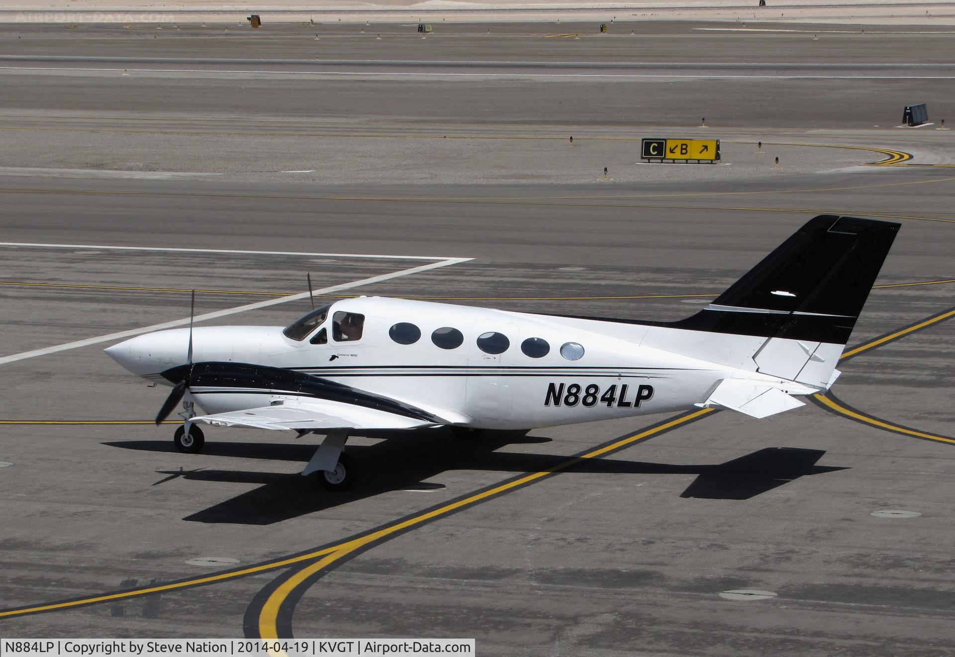 N884LP, 1976 Cessna 421C Golden Eagle C/N 421C0102, Brecton Aviation 1976 Cessna 421C from KLBB repositioning on transient ramp @ North Las Vegas Airport, NV