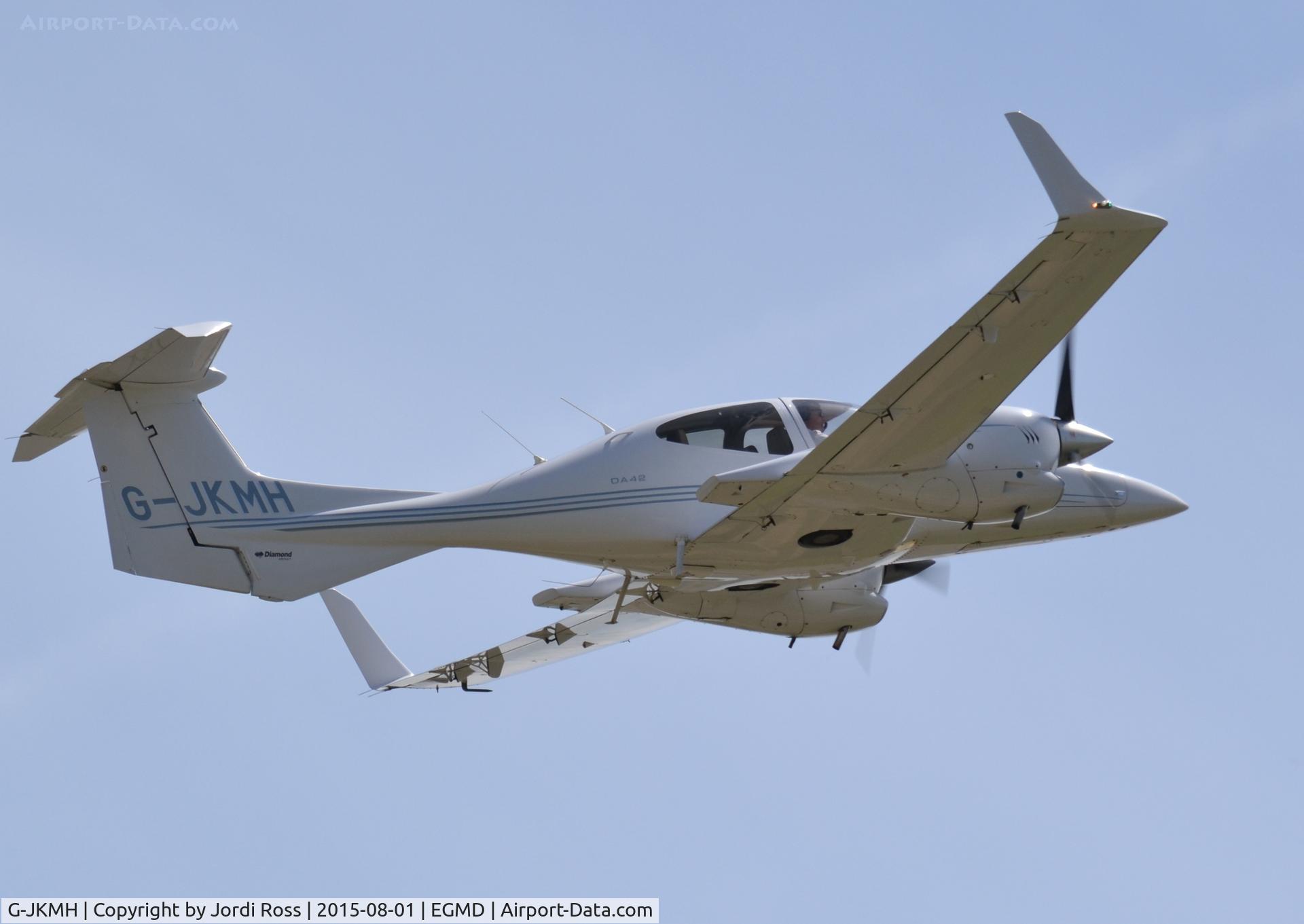 G-JKMH, 2006 Diamond DA-42 Twin Star C/N 42.168, Climbing out of Lydd after a touch 'n' go