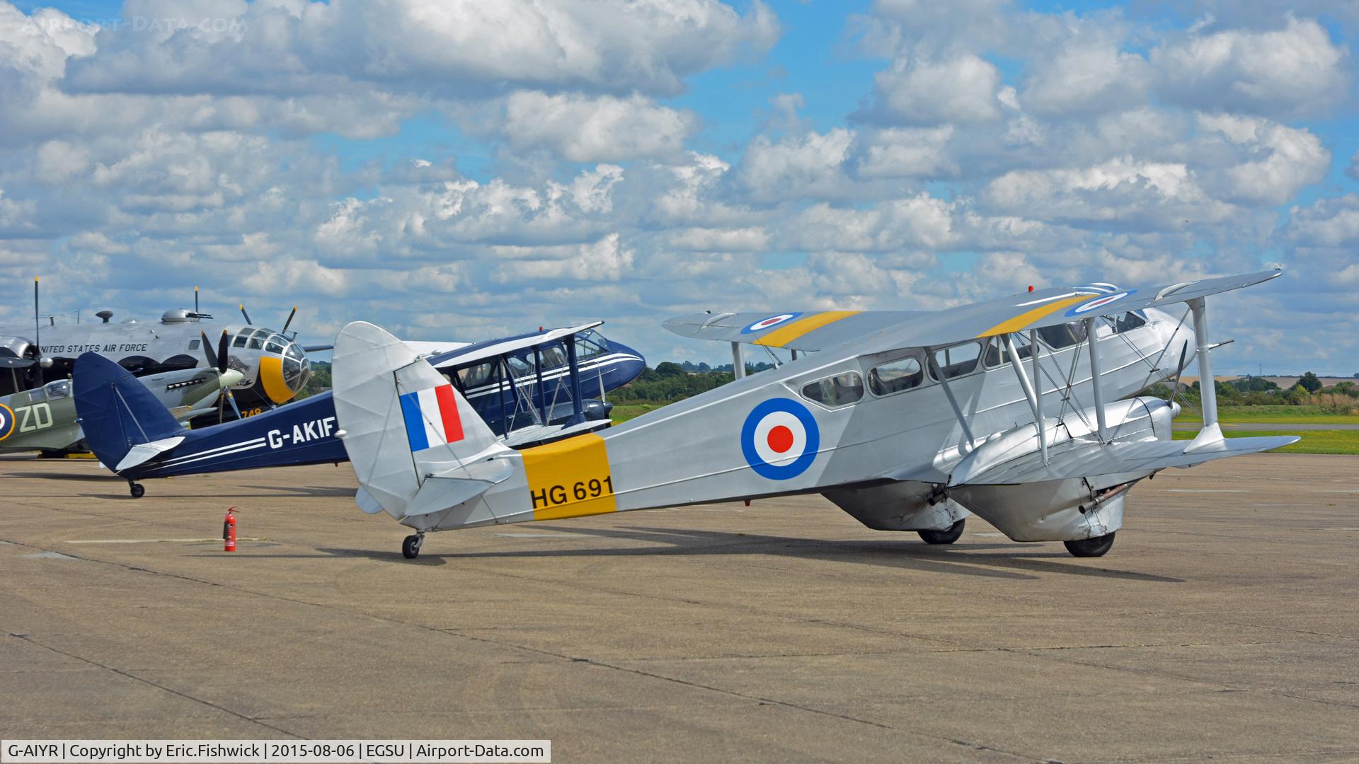 G-AIYR, 1943 De Havilland DH-89A Dominie/Dragon Rapide C/N 6676, 5. HG691 - a pair of DH-89A's taking a short break - but in great demand at Duxford during the Summer Holidays, 2015.