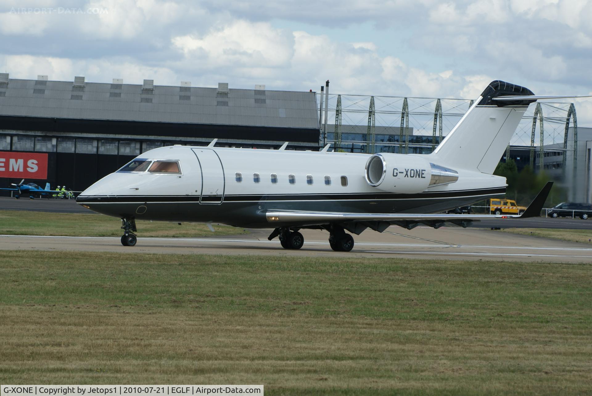 G-XONE, 1999 Bombardier Challenger 604 (CL-600-2B16) C/N 5426, Departing EGLF / Fboro International Airshow in 2010
