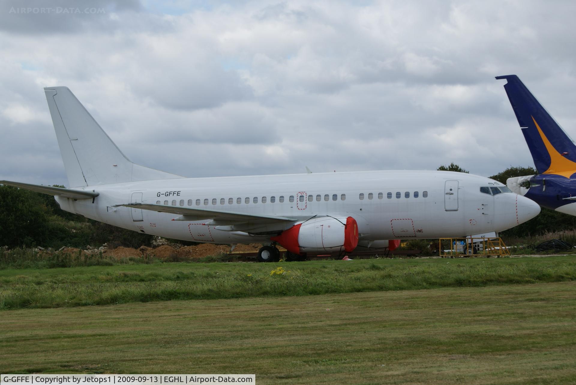 G-GFFE, 1995 Boeing 737-528 C/N 27424, On ground at ATC lasham / EGHL awaiting the scrap heap
