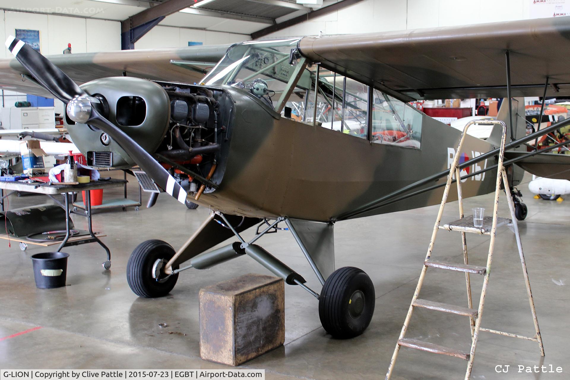 G-LION, 1954 Piper L-21B Super Cub (PA-18-135) C/N 18-3857, Undergoing maintenance in the spotlessly clean AKKI Aero Engineering facility at Turweston EGBT.