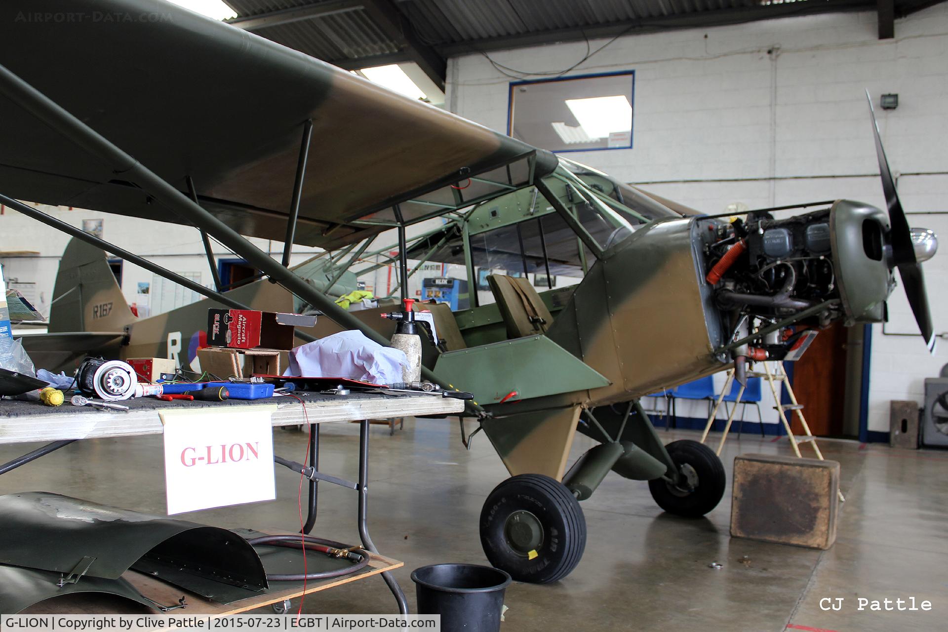 G-LION, 1954 Piper L-21B Super Cub (PA-18-135) C/N 18-3857, Undergoing maintenance in the spotlessly clean AKKI Aero Engineering facility at Turweston EGBT.