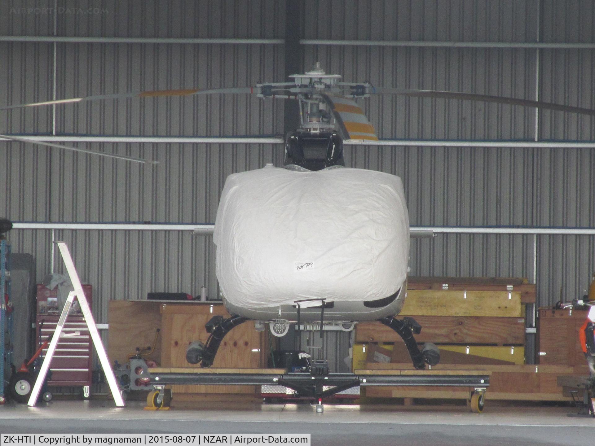 ZK-HTI, Eurocopter EC-130T-2 C/N 7696, tucked away in airbus hangar