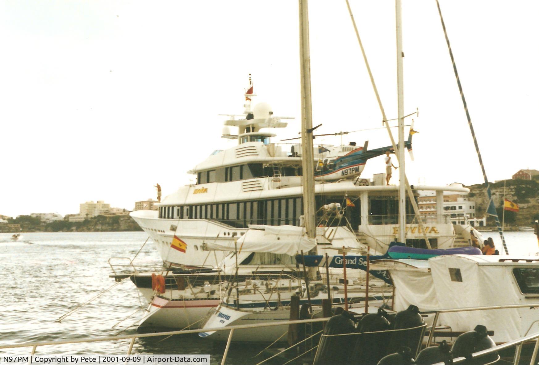N97PM, Bell 407 C/N 53039, Seen on the back of a luxury yacht in Palma harbour, Menorca 2001