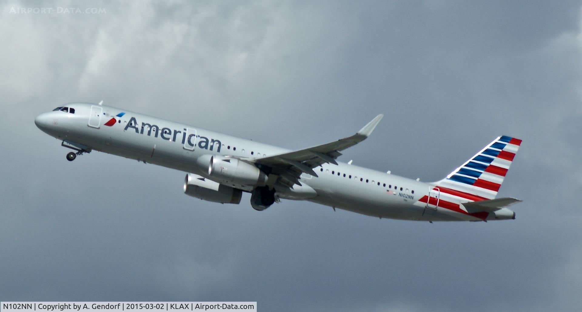 N102NN, 2013 Airbus A321-231 C/N 5860, American Airlines, is here climbing out at Los Angeles Int'l(KLAX)