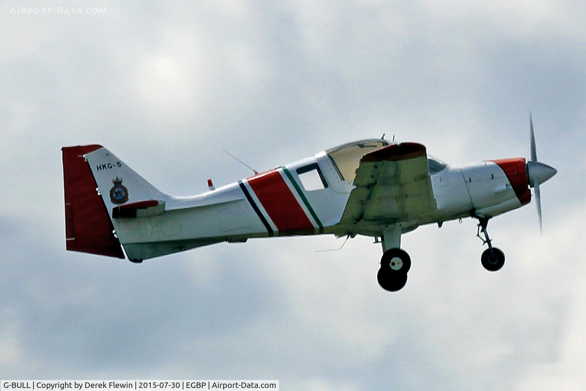 G-BULL, 1977 Scottish Aviation Bulldog Series 120 Model 128 C/N BH120/392, Bulldog, Oaksey Park based, previously G-31-18, permit to fly as Hong Kong Defence Force HGK-5, seen departing runway 26.