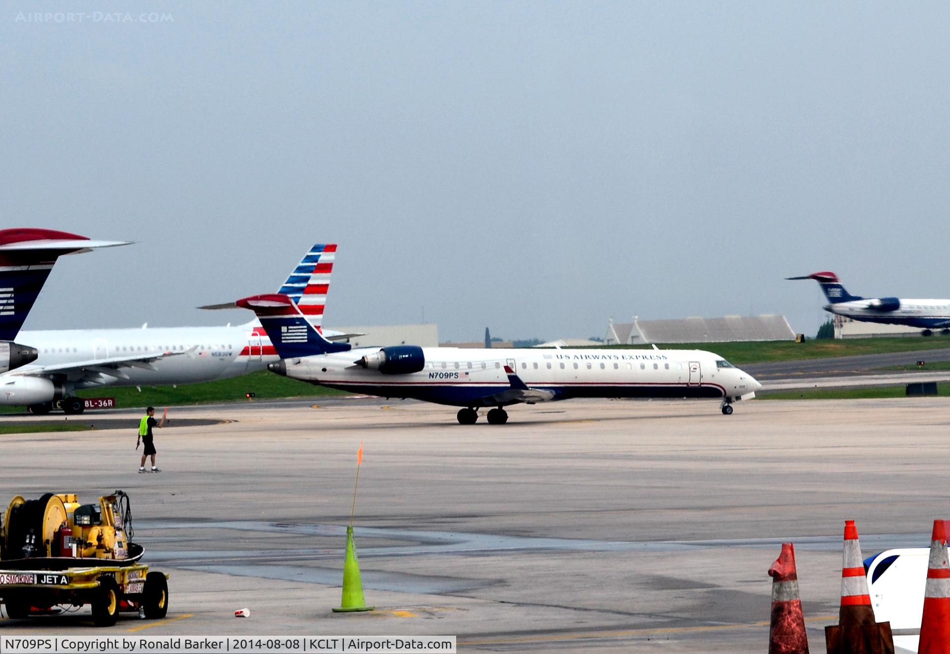 N709PS, 2004 Bombardier CRJ-701 (CL-600-2C10) Regional Jet C/N 10165, Taxi CLT