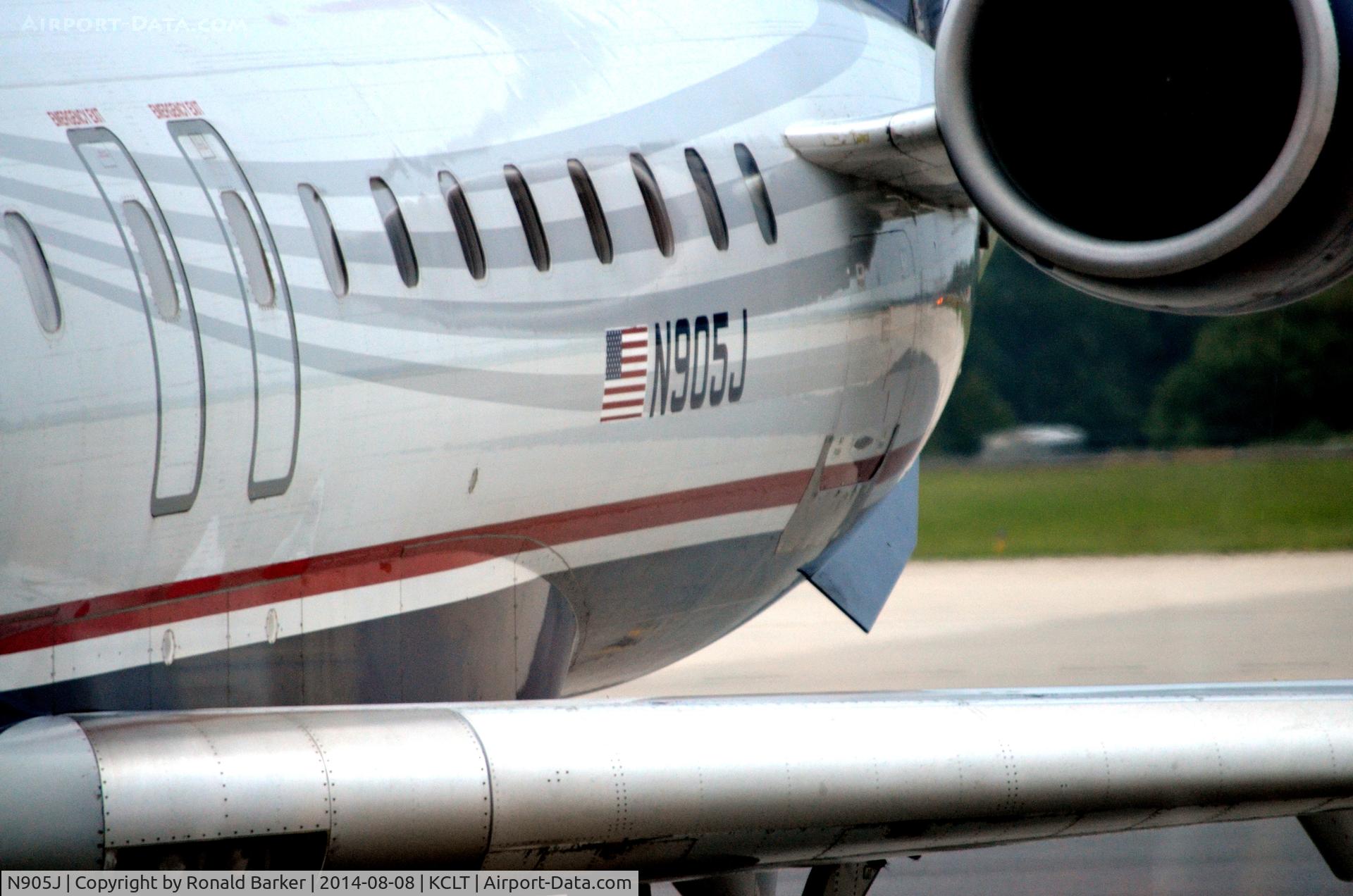 N905J, 2003 Bombardier CRJ-900 (CL-600-2D24) C/N 15005, closeup CLT