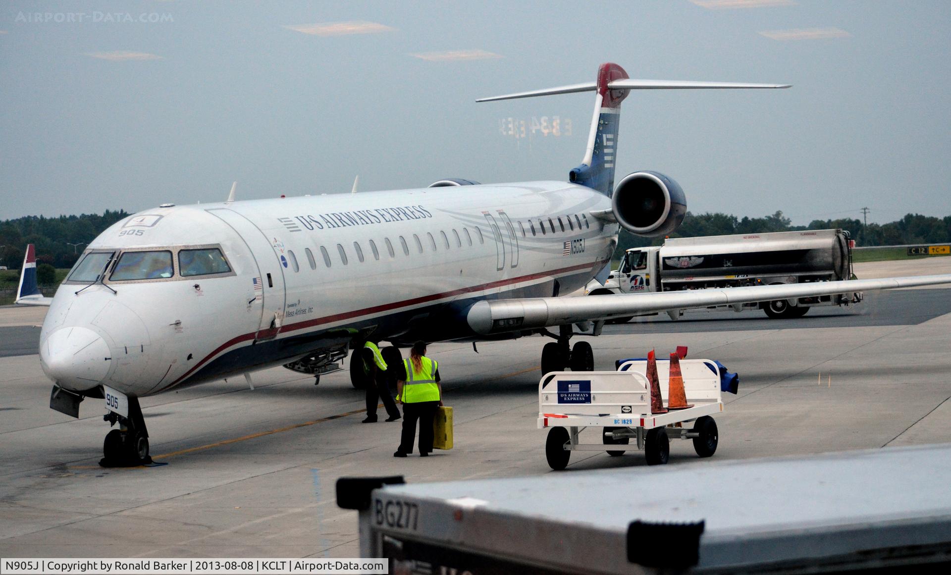 N905J, 2003 Bombardier CRJ-900 (CL-600-2D24) C/N 15005, At the gate CLT
