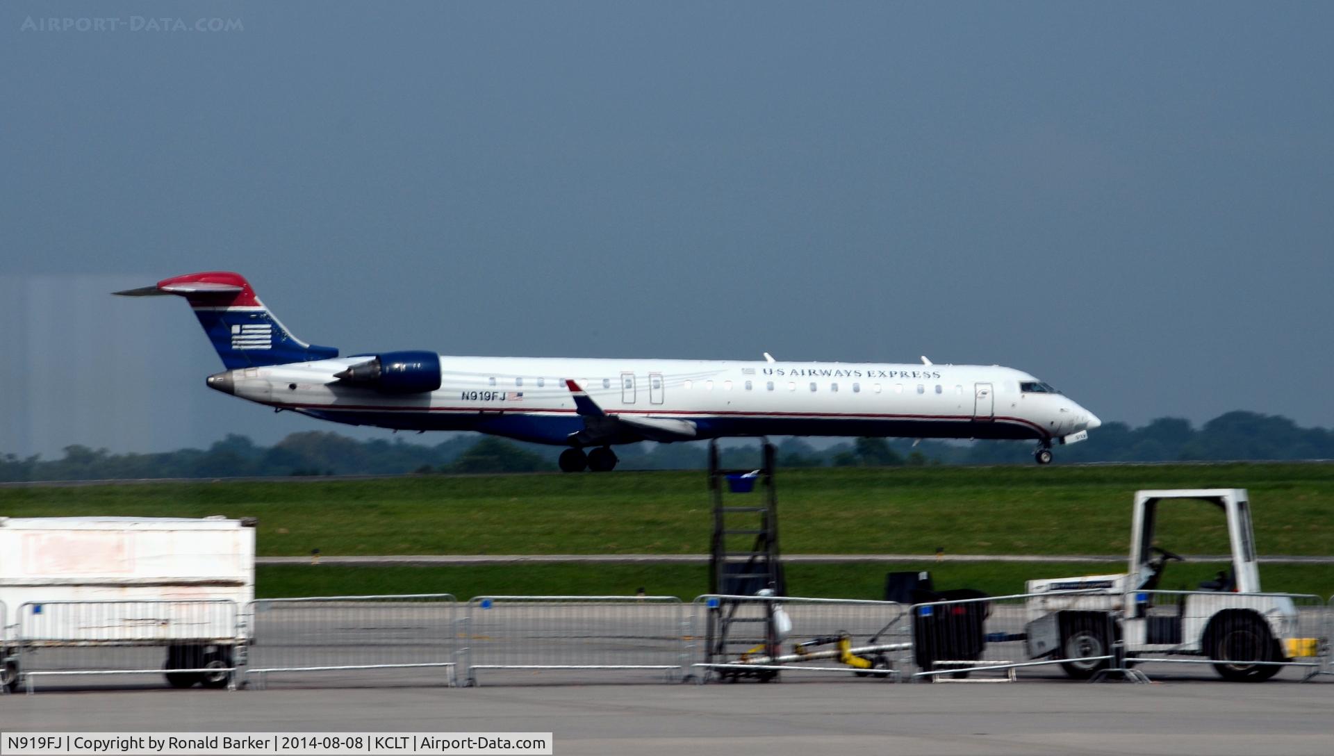 N919FJ, 2004 Bombardier CRJ-900ER (CL-600-2D24) C/N 15019, Takeoff CLT