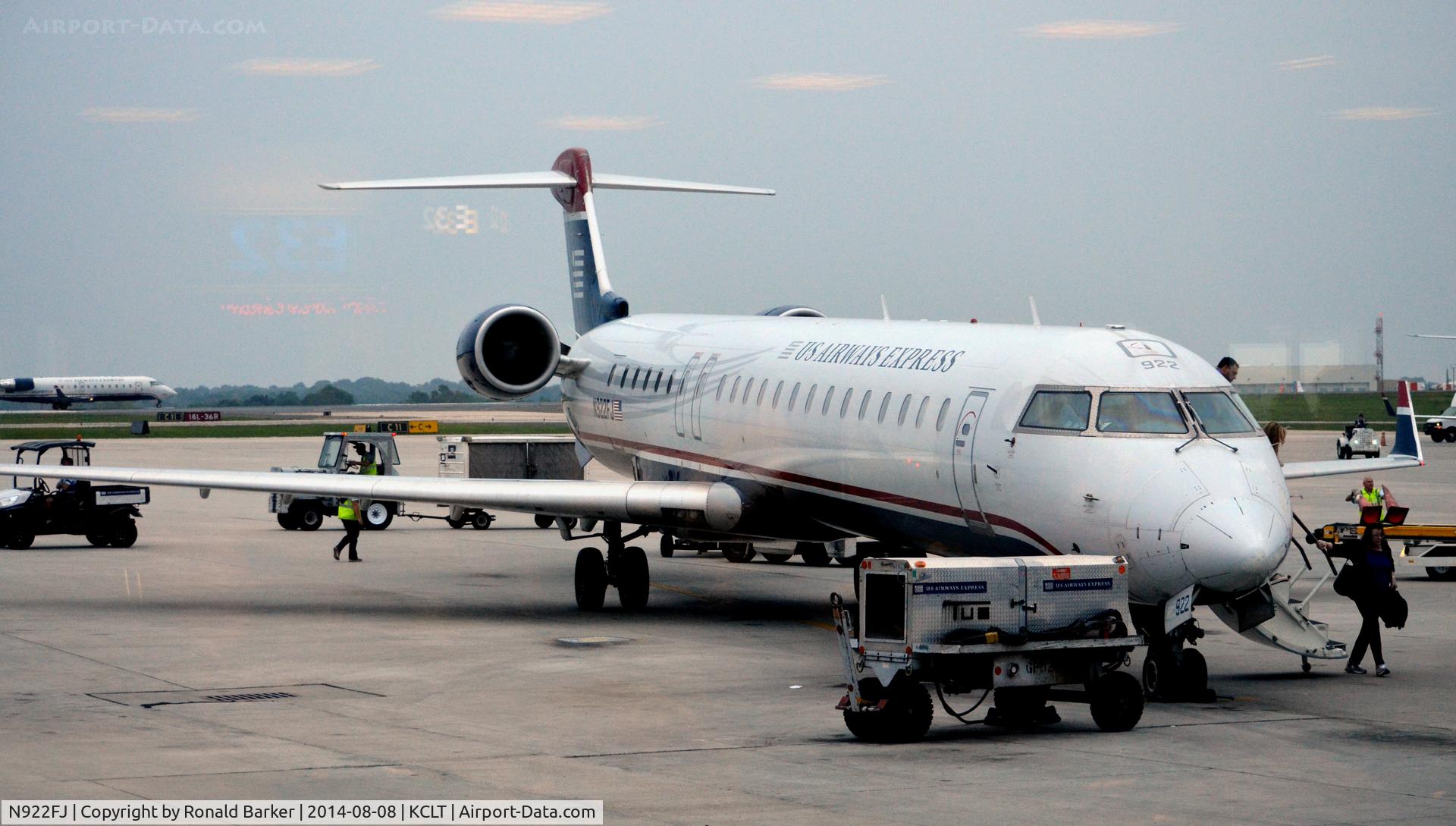 N922FJ, 2004 Bombardier CRJ-900ER (CL-600-2D24) C/N 15022, At the gate CLT