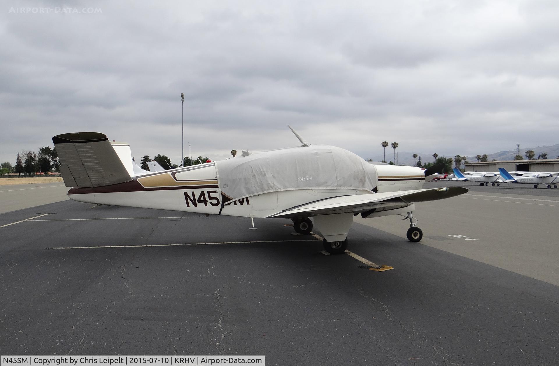 N45SM, 1963 Beech P35 Bonanza C/N D-7301, 45SM LLC (Dayton, OH) transient 1963 Beechcraft P35 Bonanza parked at transient parking on an overcast morning at Reid Hillview Airport, CA.