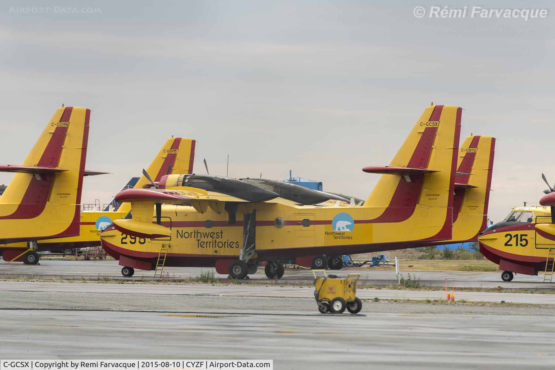 C-GCSX, 1986 Canadair CL-215-V (CL-215-1A10) C/N 1088, Parked with 7 other water bombers @ Territorial area at Yellowknife Airport. Overcast day so no flying, but saw it landing last night.