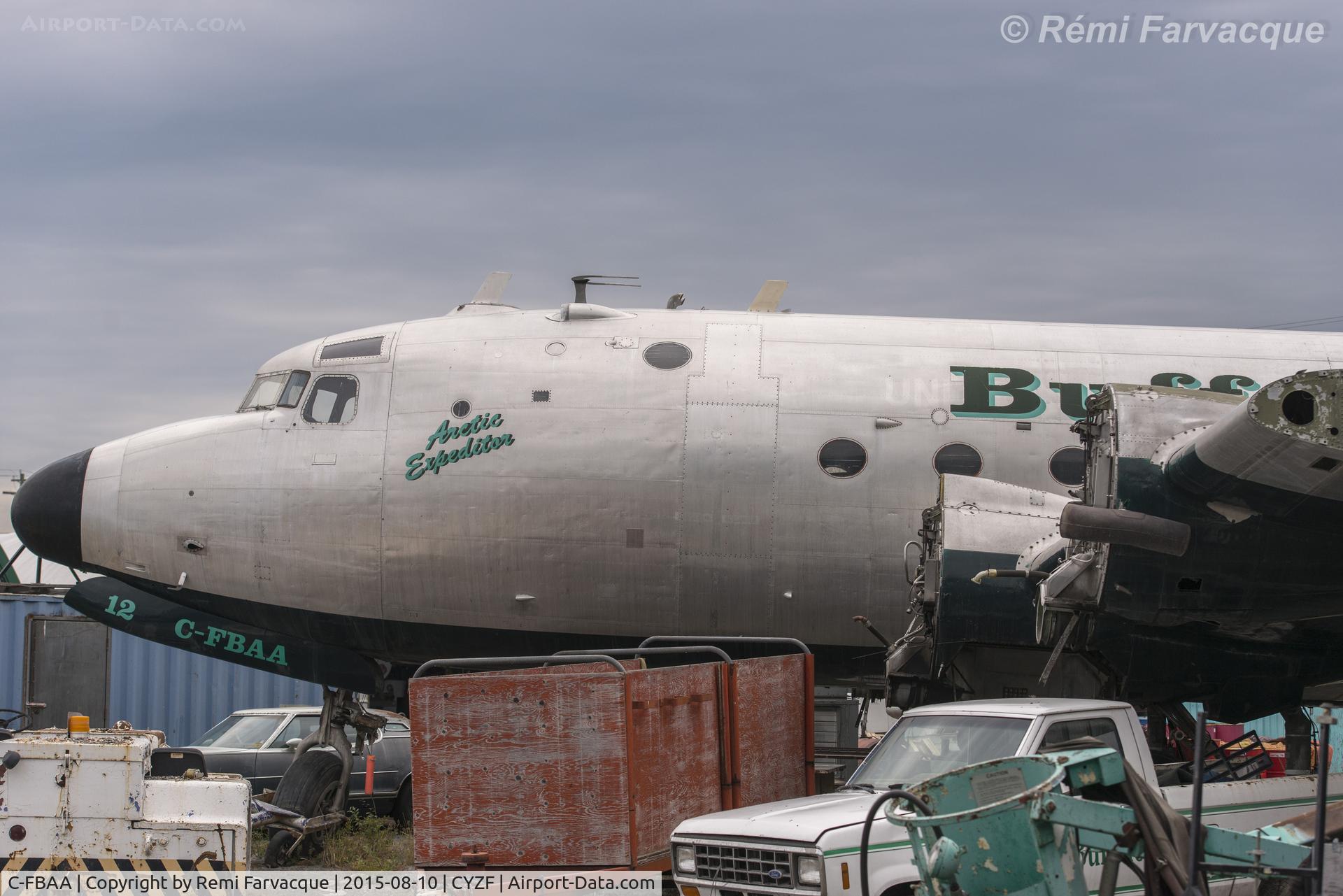 C-FBAA, 1945 Douglas C54D-DC C/N 10653, Sadly, this one will likely never fly again. Difficult to photograph as tucked in between seacans.