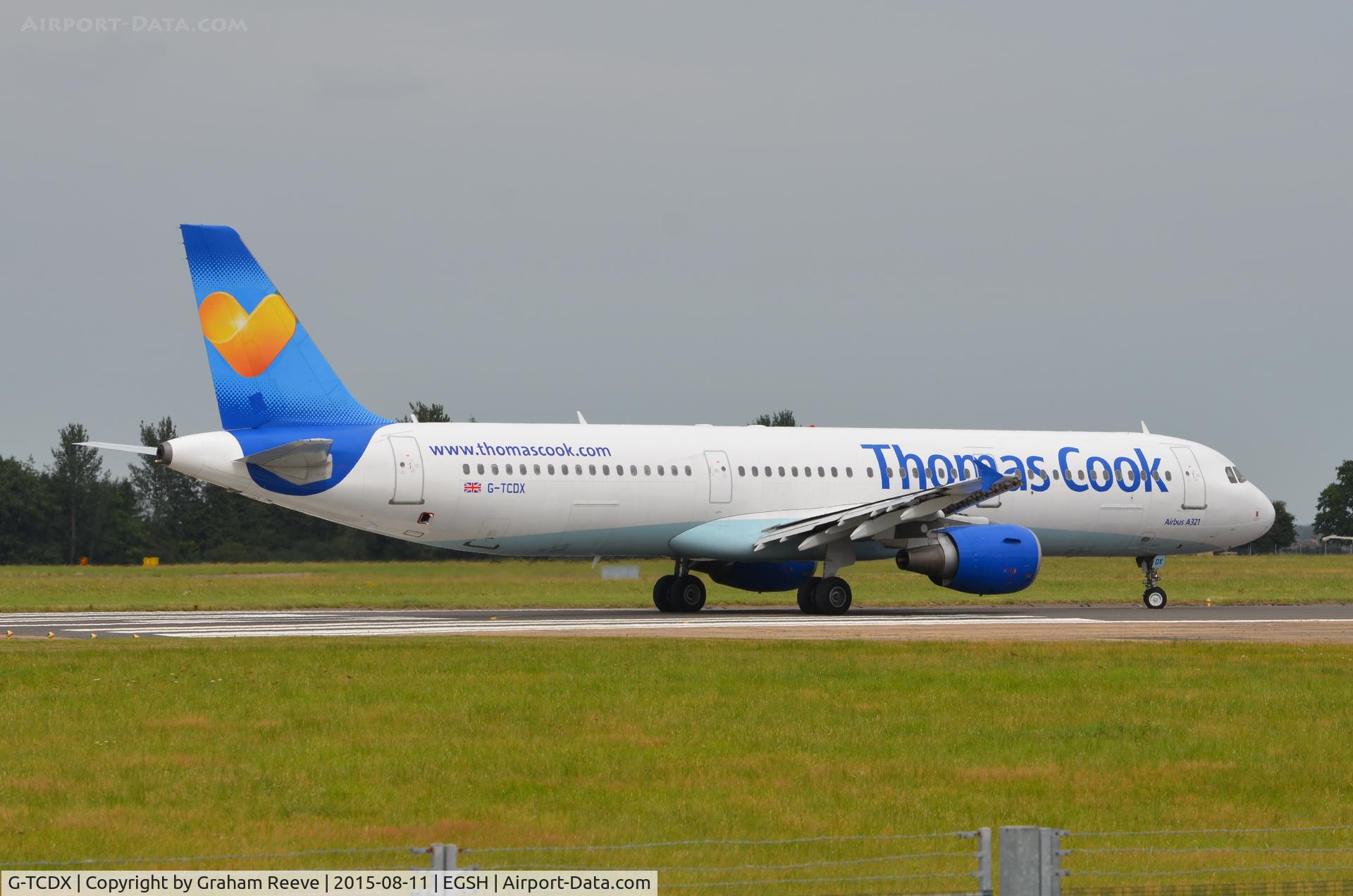 G-TCDX, 2002 Airbus A321-211 C/N 1887, About to depart.