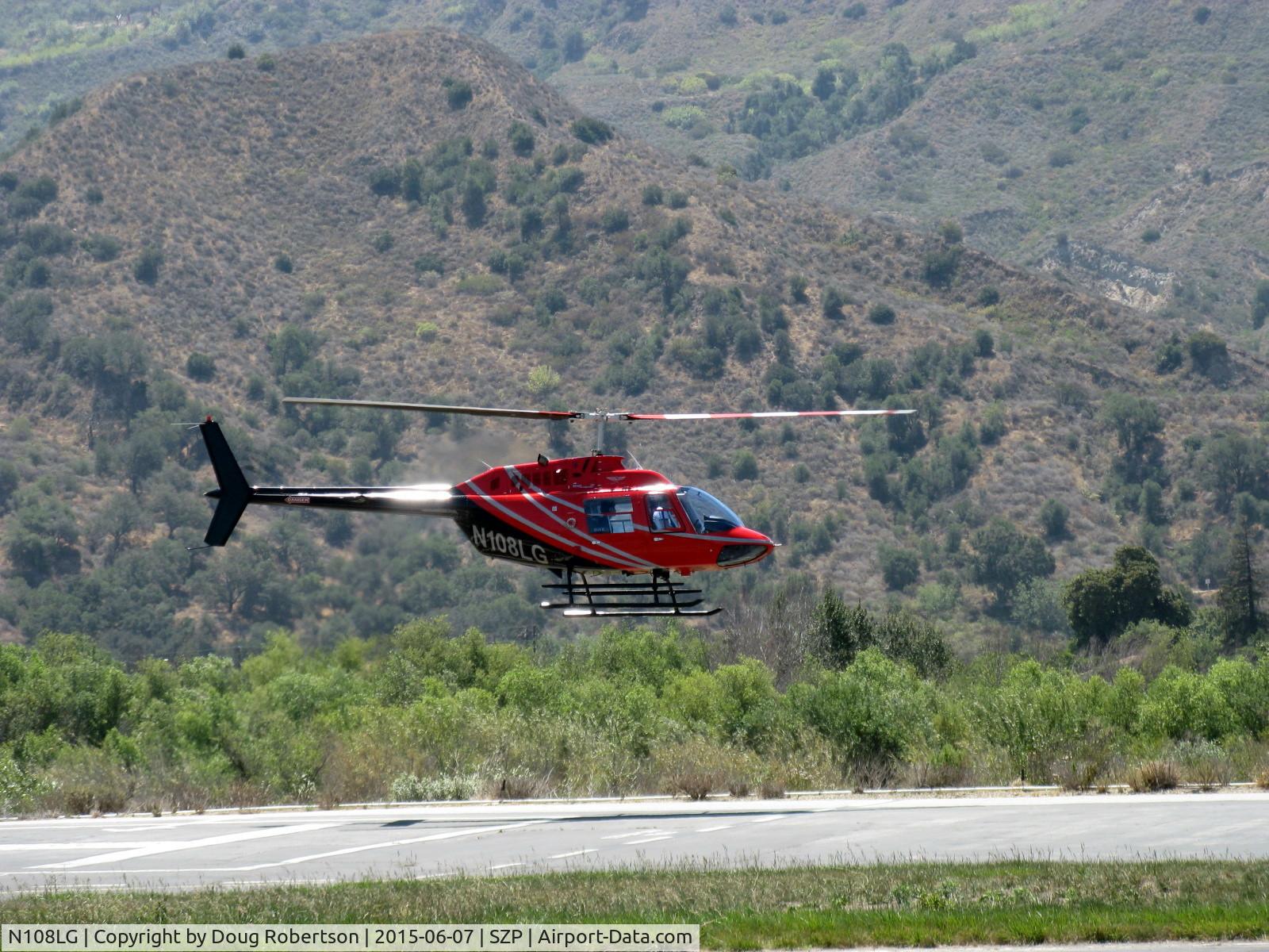 N108LG, 1998 Bell 206B JetRanger III C/N 4481, 1998 Bell 206B JetRanger III, Allison 250 C20B Turboshaft 420 shp flat rated at 317 shp, departure climb from SZP's Helipad
